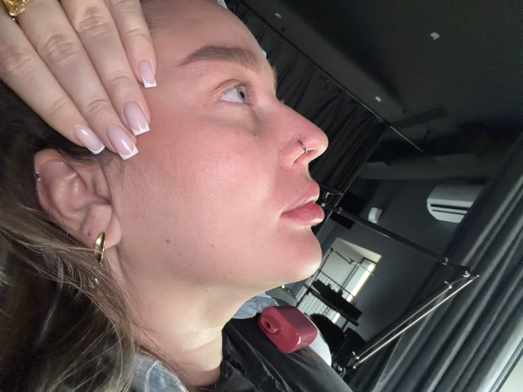 Individual with blonde hair, piercings spotted in Moscow