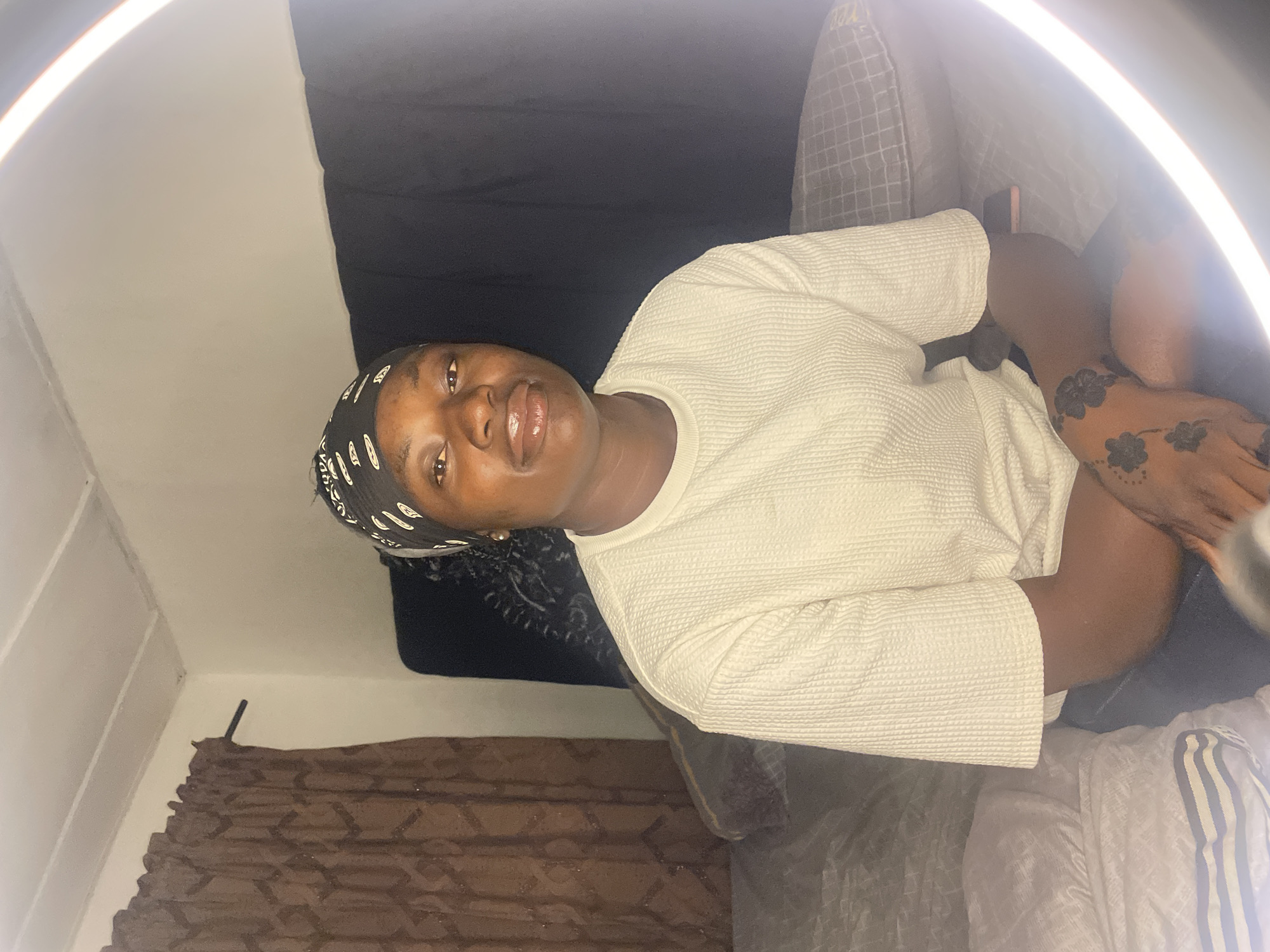 Woman conducts indoor photo session in Jos, Nigeria
