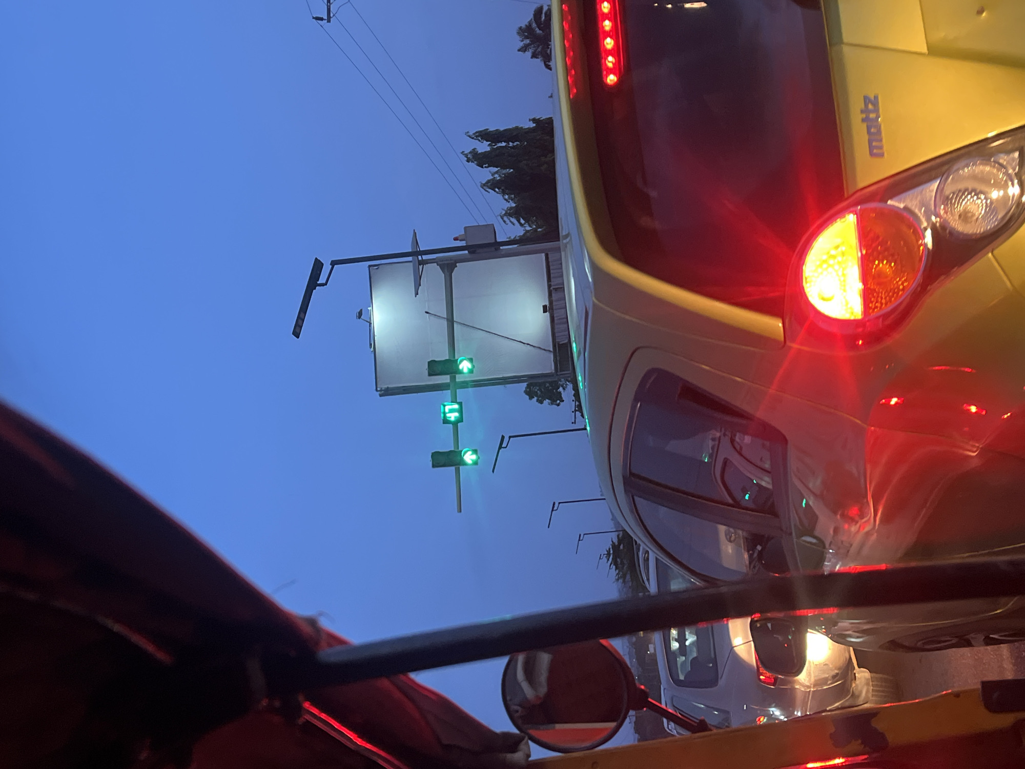 Evening traffic captured in Galadimawa, Nigeria street scene
