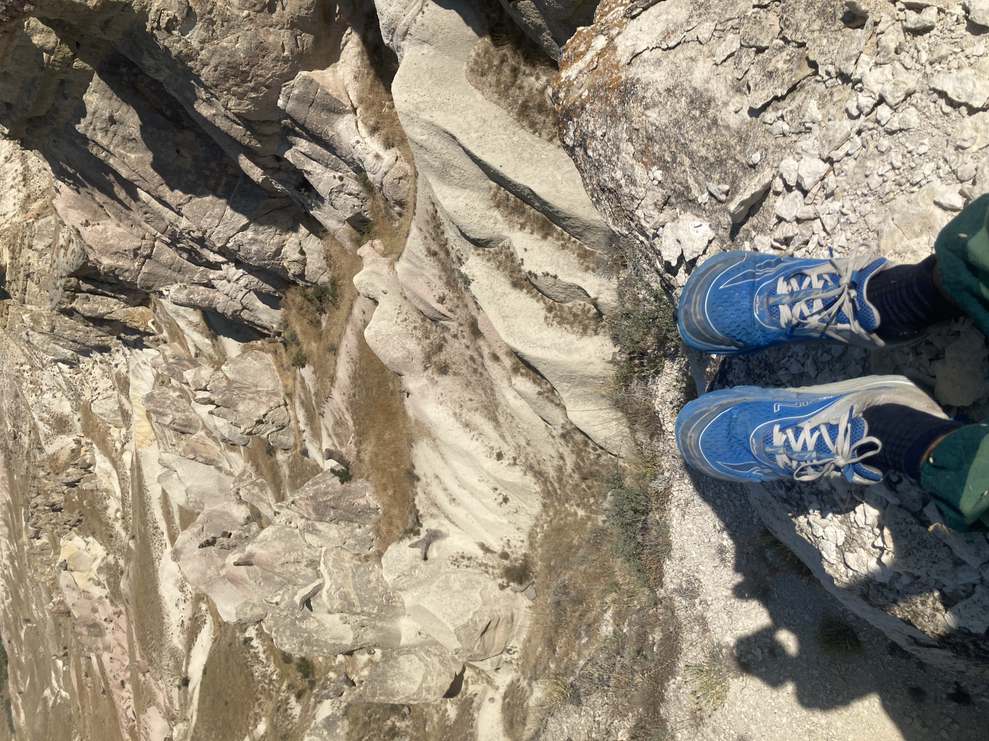 Standing on the rocks above Cappadocia's fairy chimneys