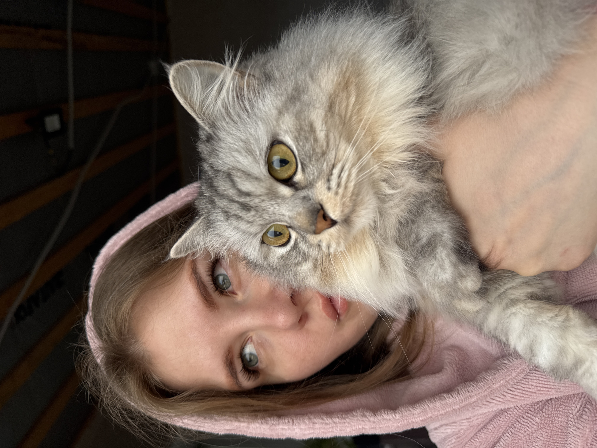 Woman photographed with cat in casual portraits, Gornyi Russia