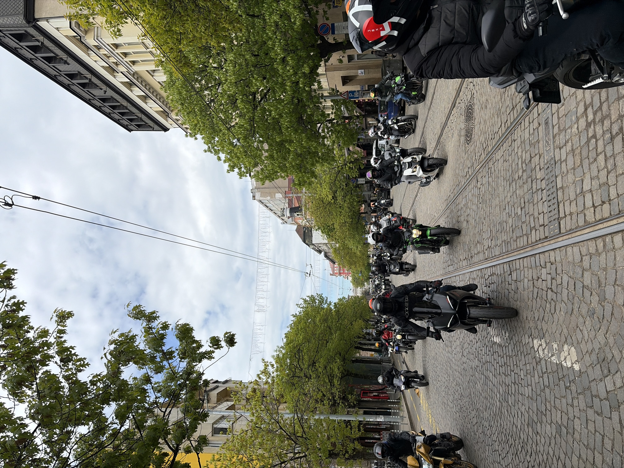 Motorcycle group rides through Sofia's cobblestone streets