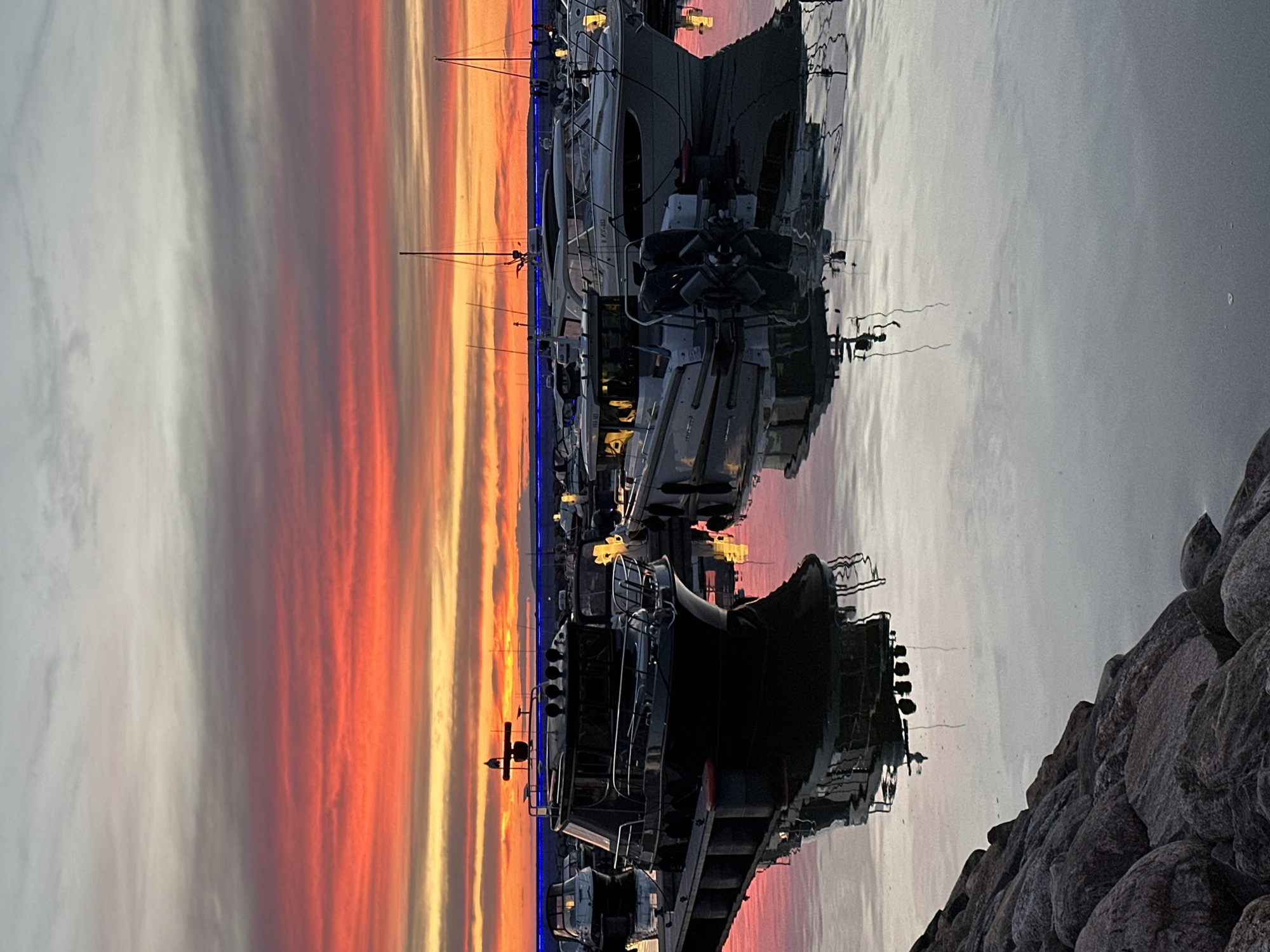Tallinn marina at sunset, boats docked under a vivid sky