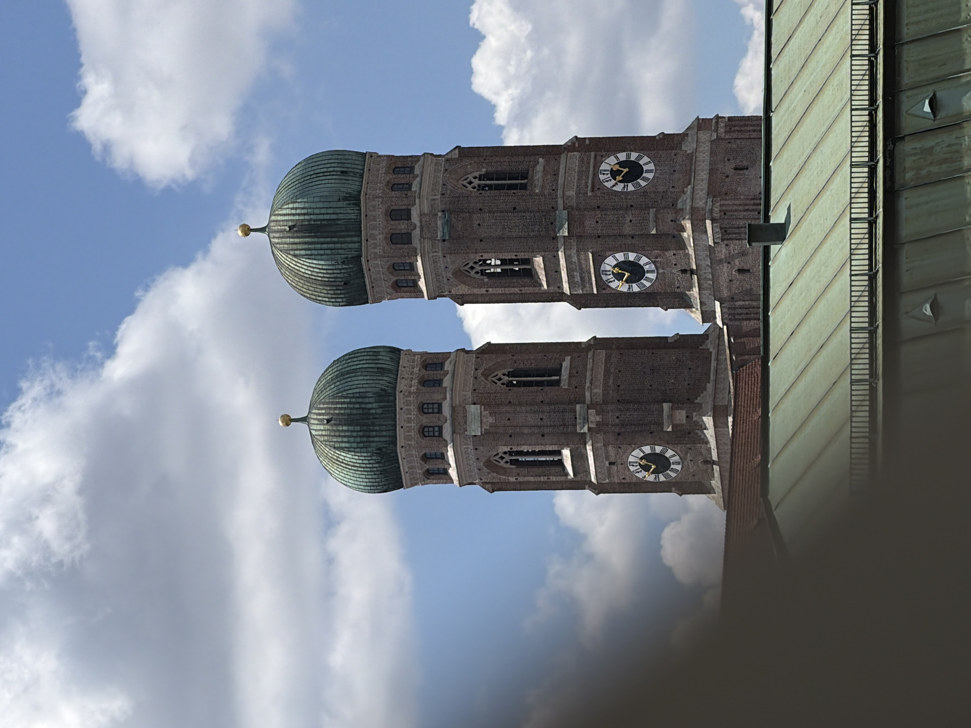 Frauenkirche twin domes rise above Munich rooftops