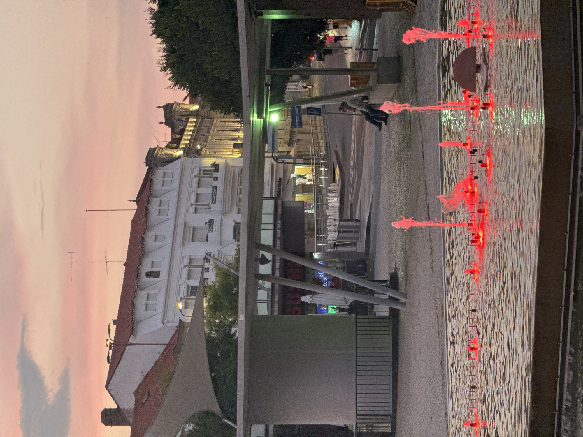 Castelo Branco at dusk: fountains, sunset skies, and city streets