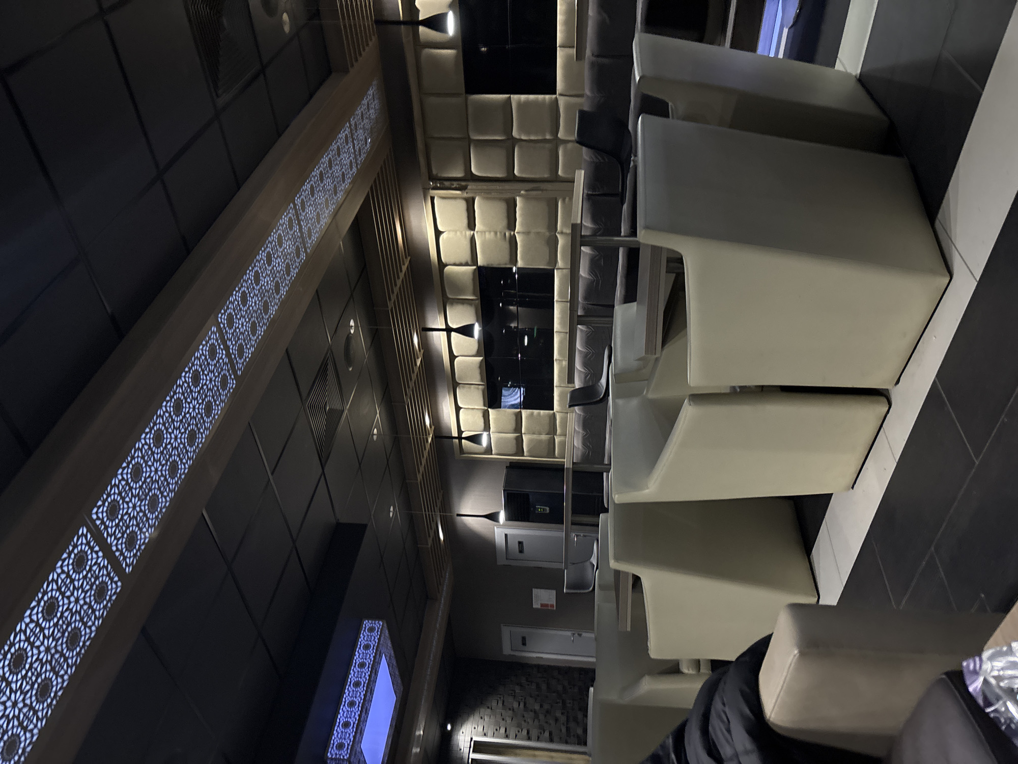 Modern lounge space with geometric lighting observed in Tutrakan