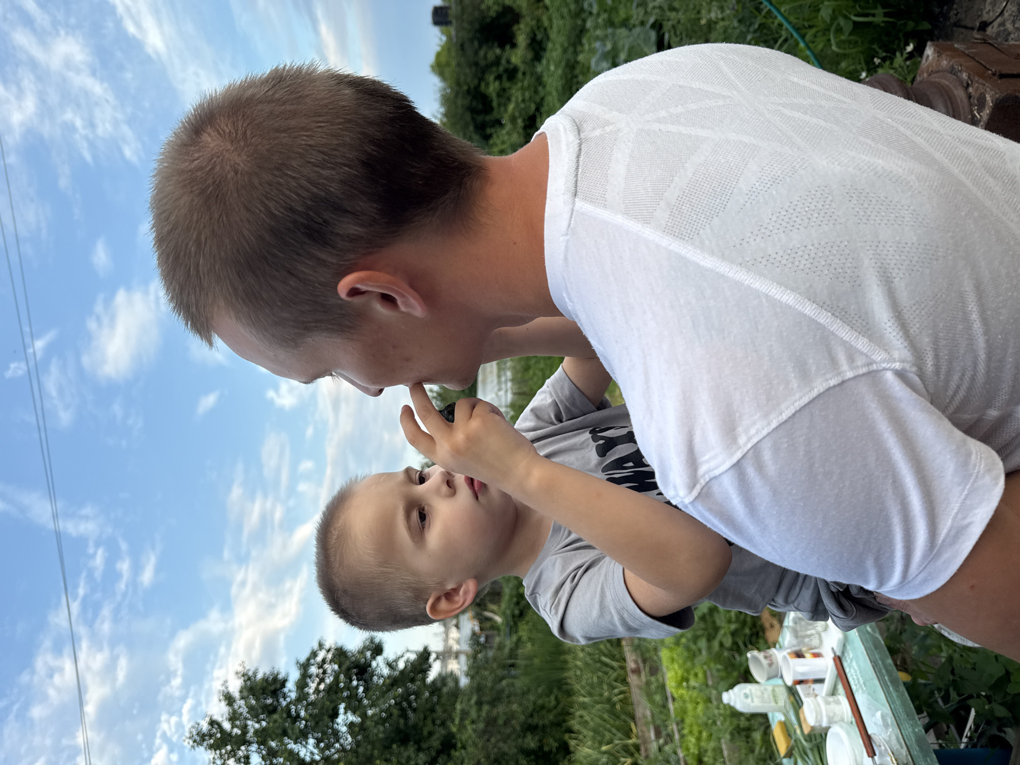 Casual outdoor gathering in Chaikovsky on a summer afternoon