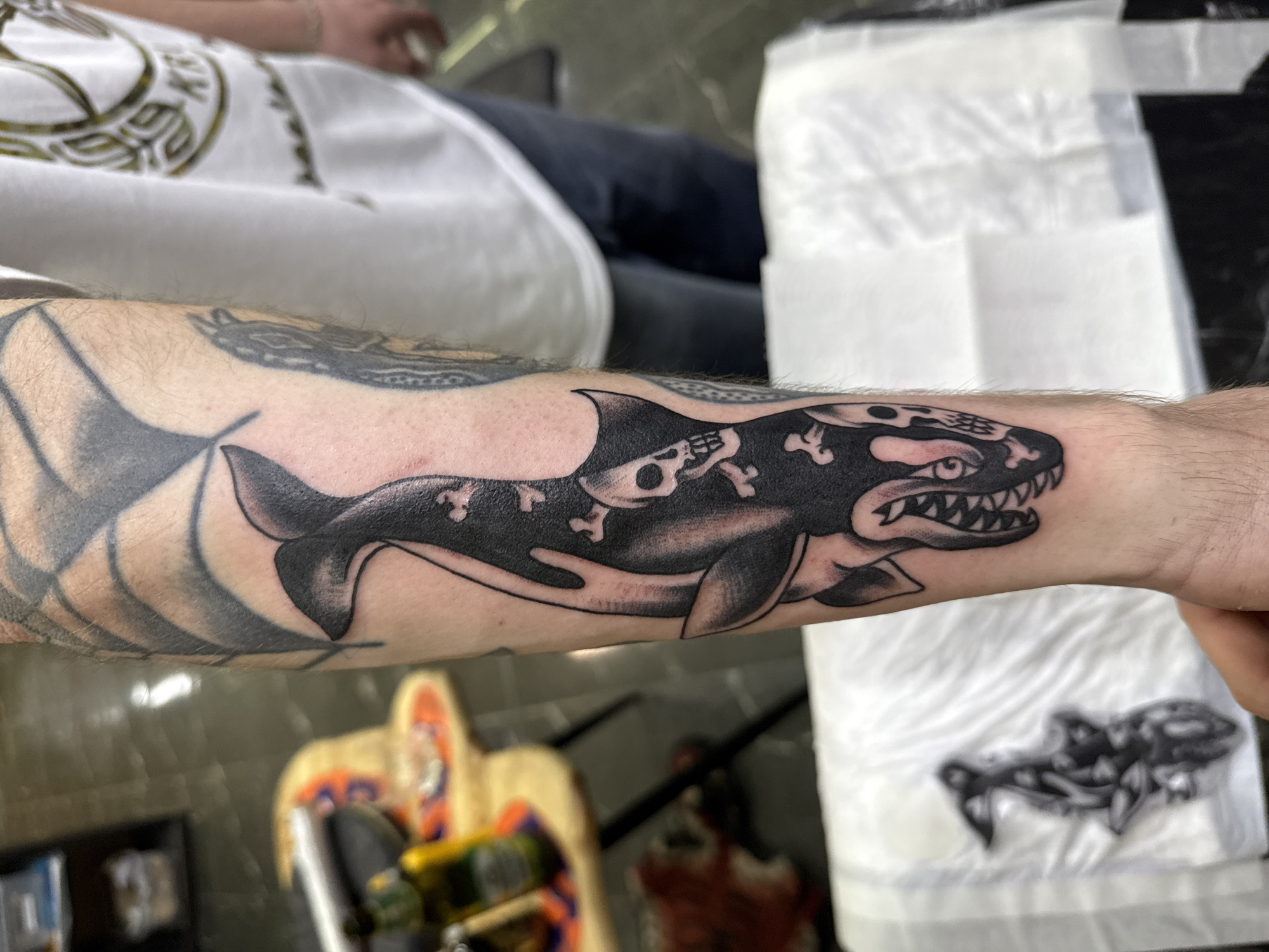 Tattooed patron spotted at Moscow bar with extensive spirits selection