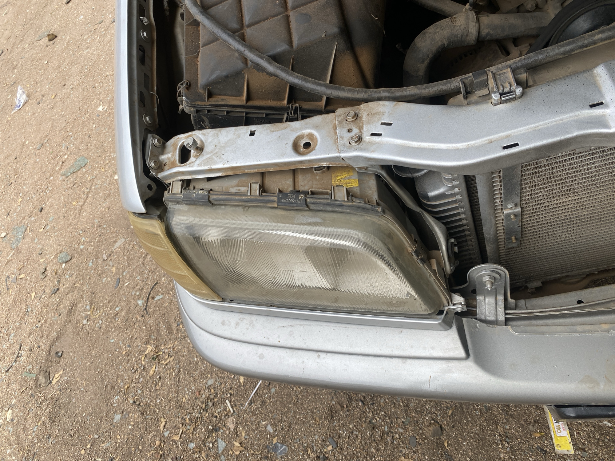 Roadside car repair documented in Jalingo, Nigeria