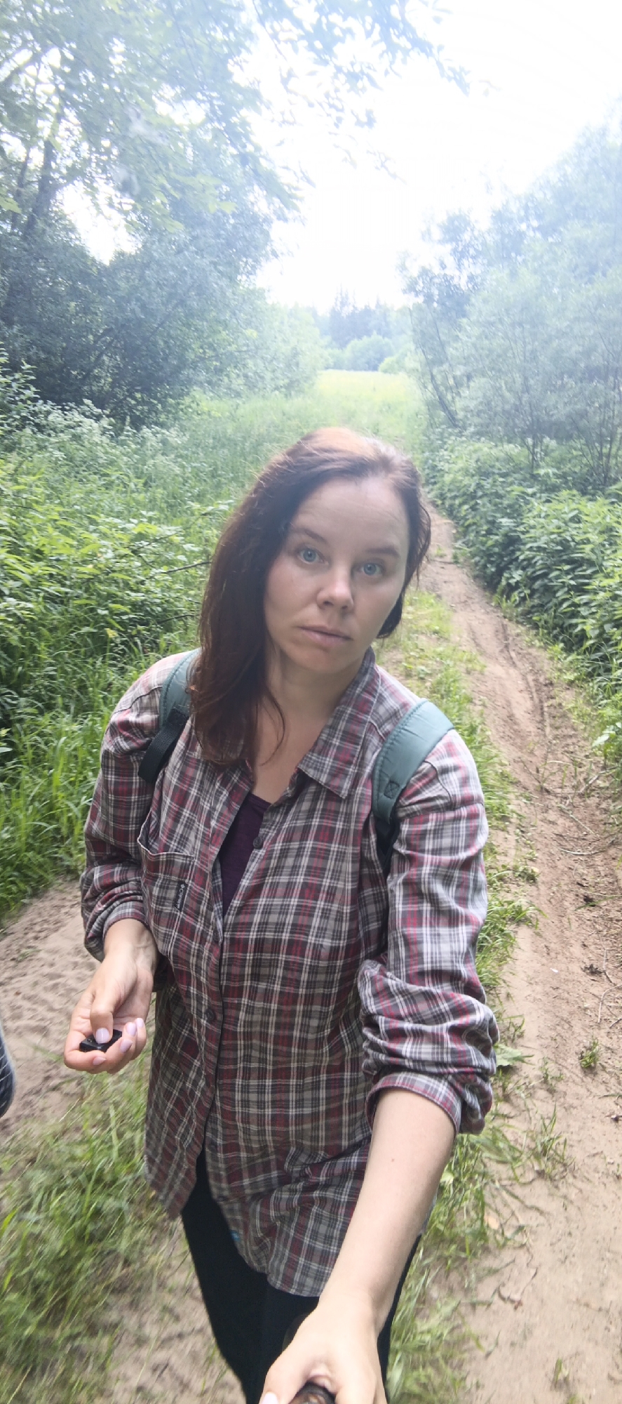 Forest hiking adventure in Garevaya, Russia with log bridge crossing