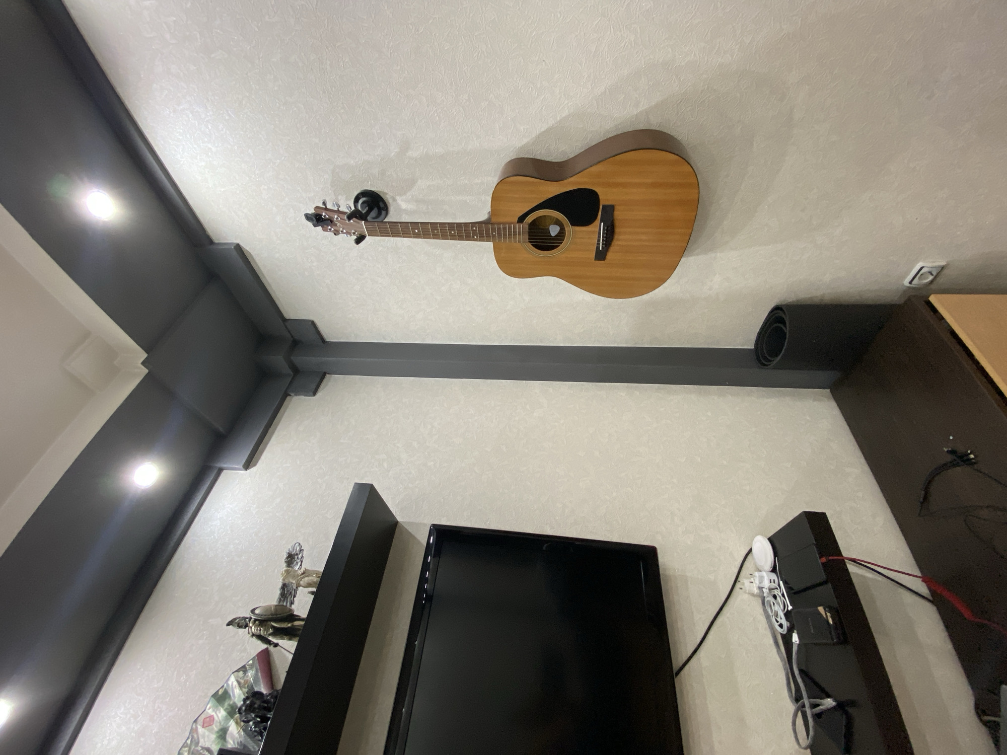Quiet afternoon moments in Tuymazy apartment with dog, guitar
