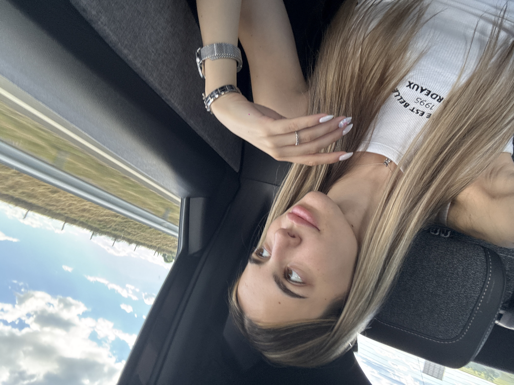 Car passenger in Zheleznik, Bulgaria looks out window