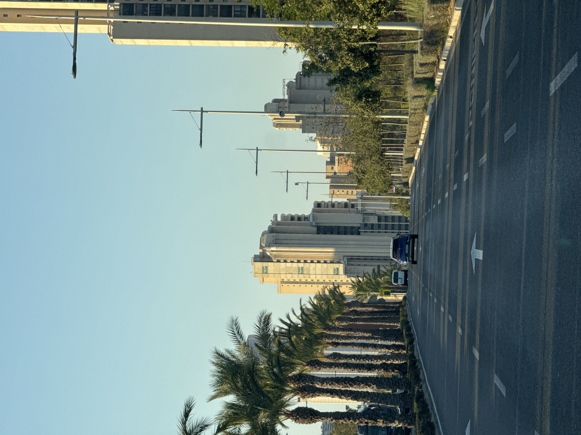 Driving through Benidorm's resort streets at sunrise
