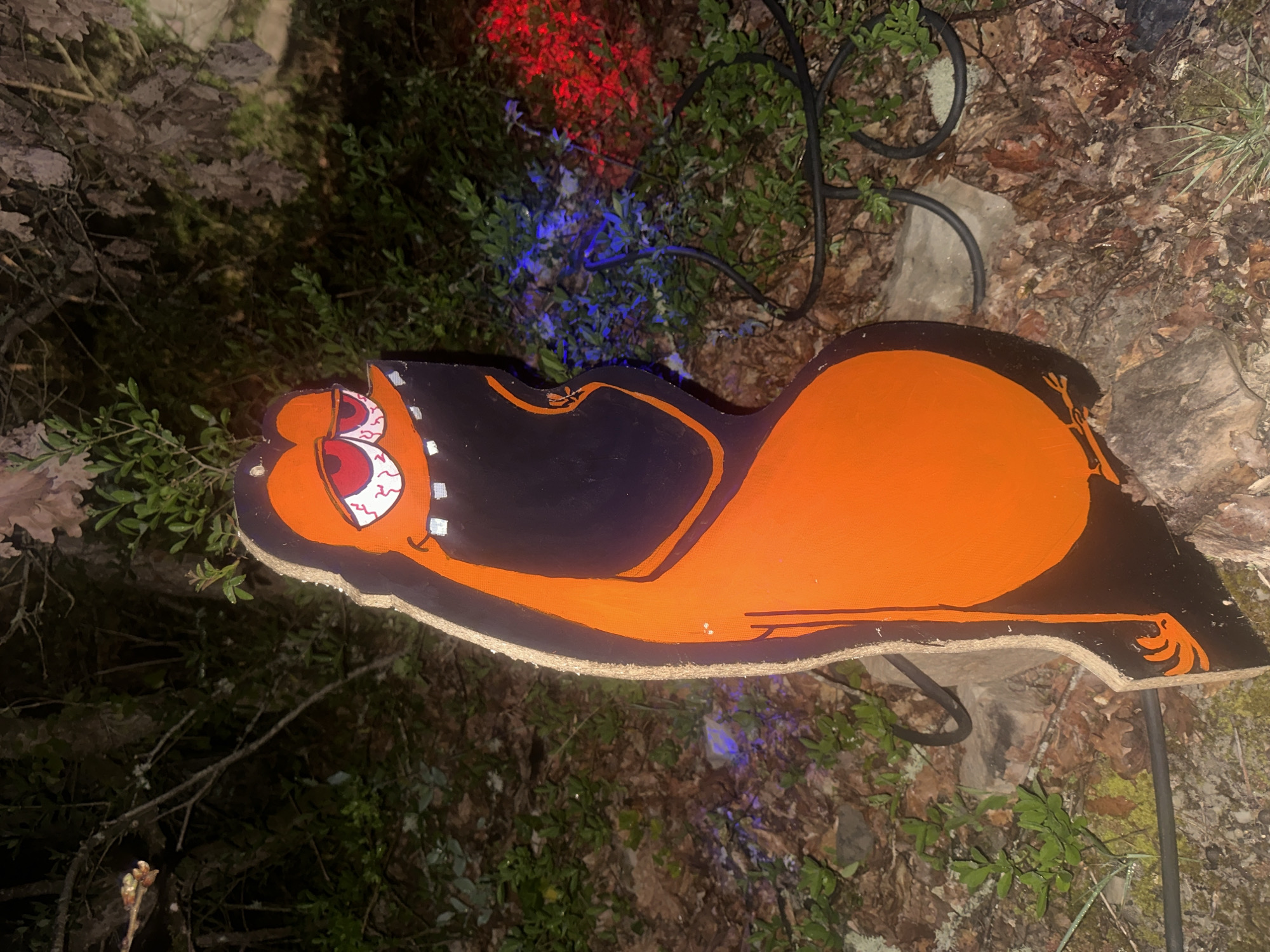 Halloween cat decoration spotted in French garden setting