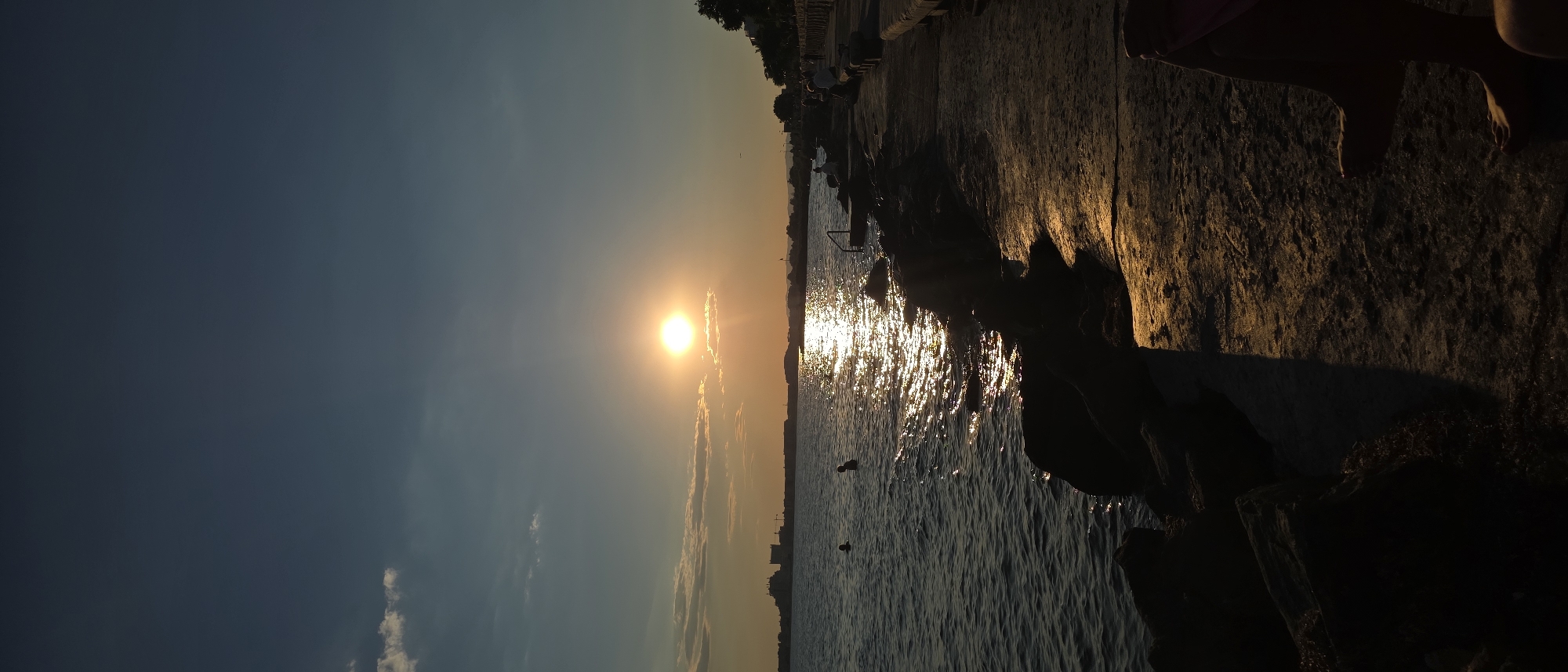 Golden sunset over the Black Sea at Pomorie's rocky shore
