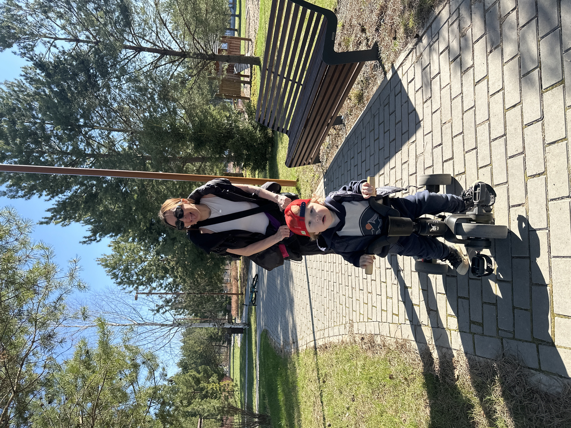 Family playground outing documented in Russian village park