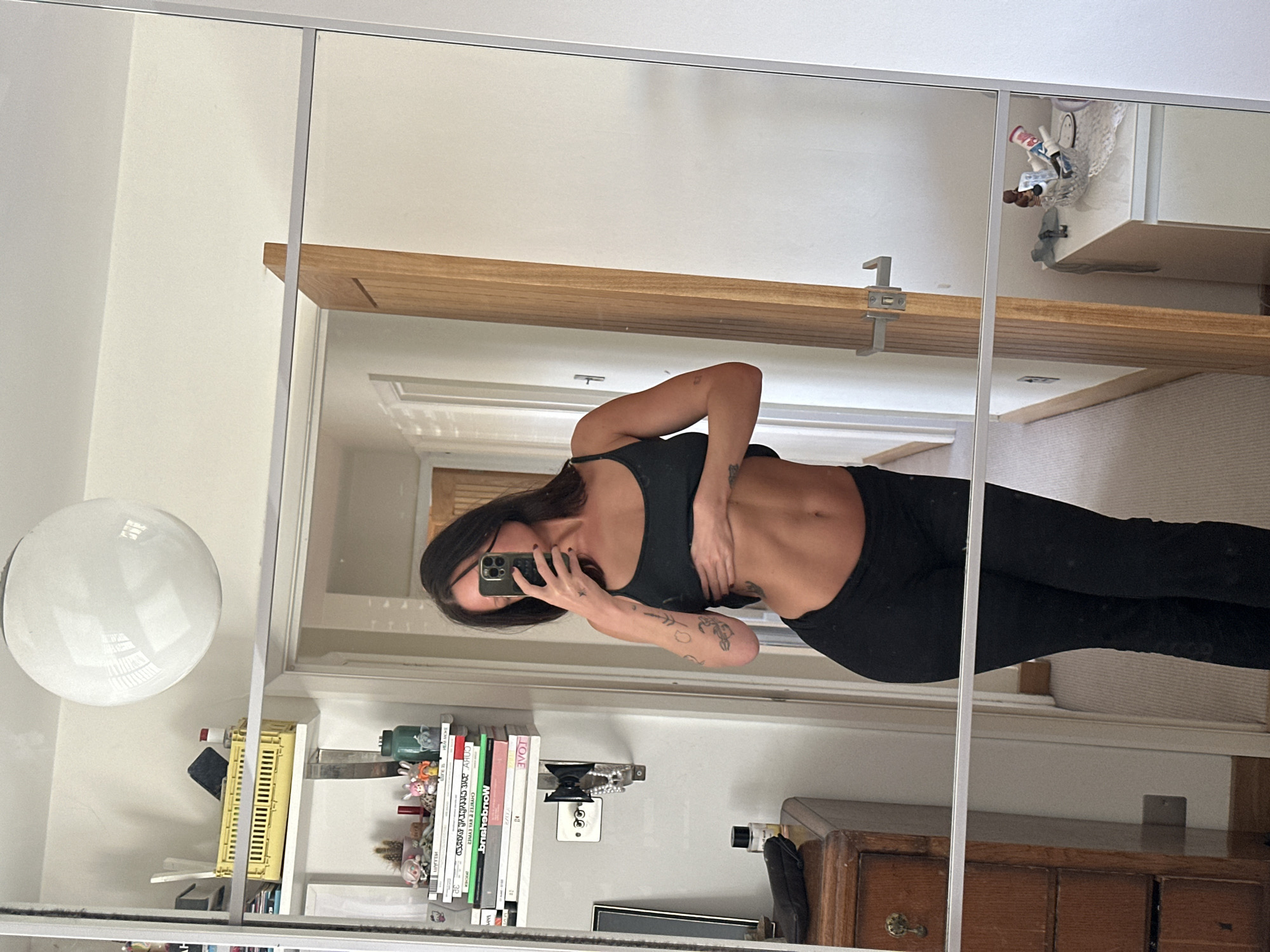 Woman Takes Mirror Selfie in Athletic Wear in Wealden