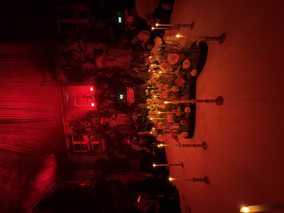 DJ event unfolds under red lights at Paris bar