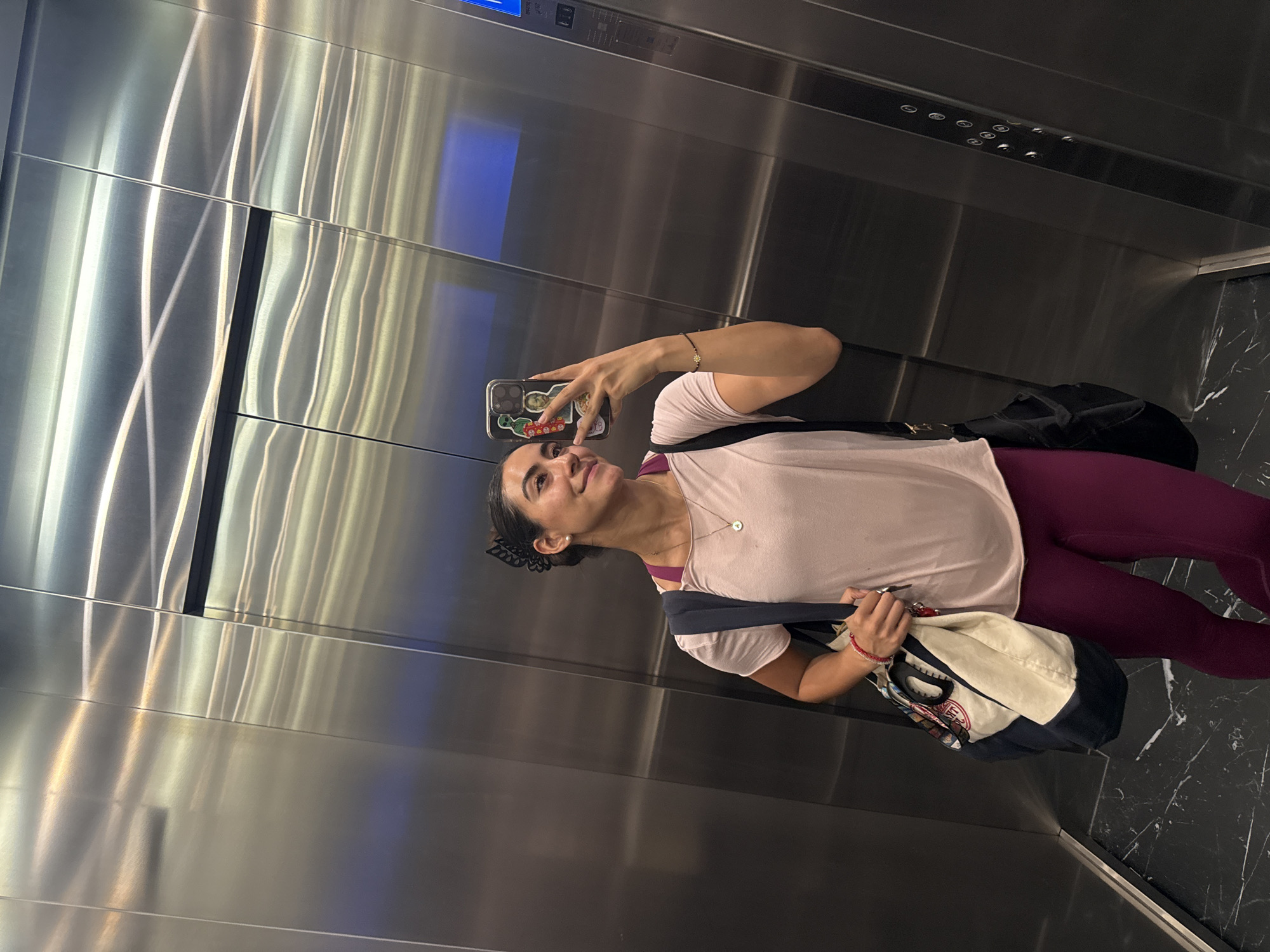 Woman takes elevator selfie in Puebla, Mexico