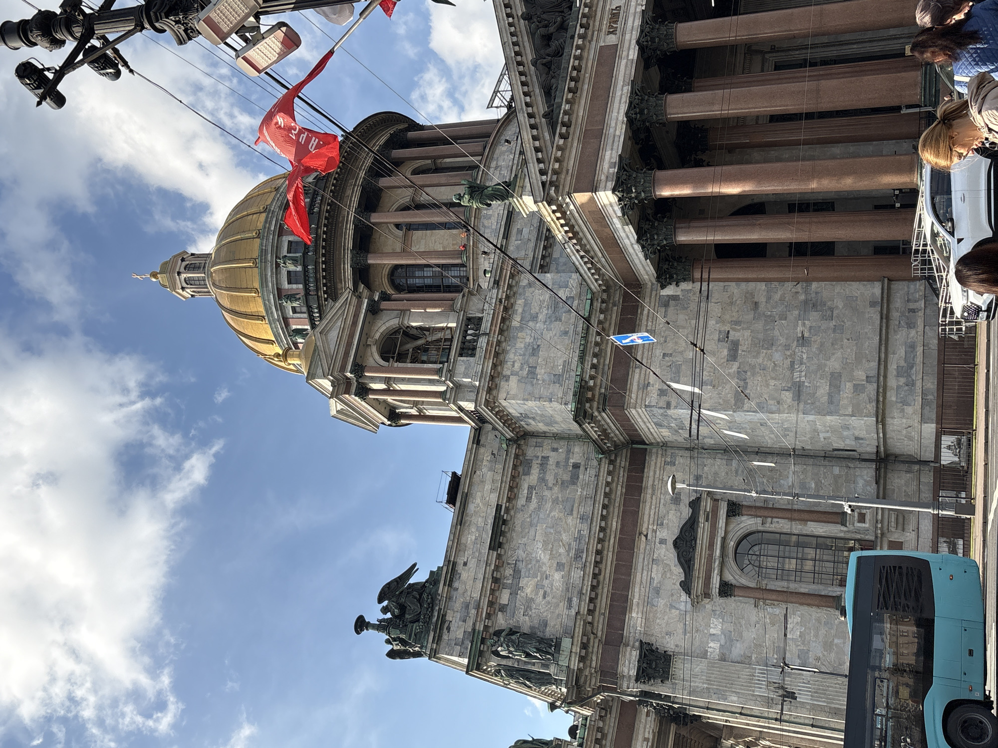 Tourist documents afternoon walk through historic Saint Petersburg landmarks