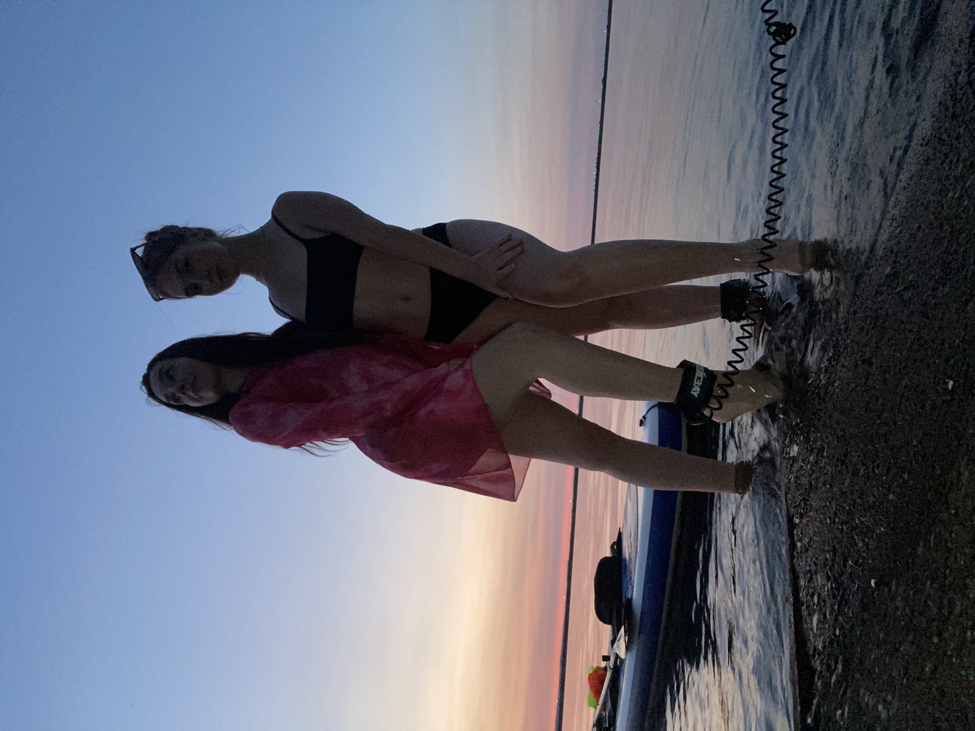 Sunset paddleboarding on calm water in Chaikovsky, Russia