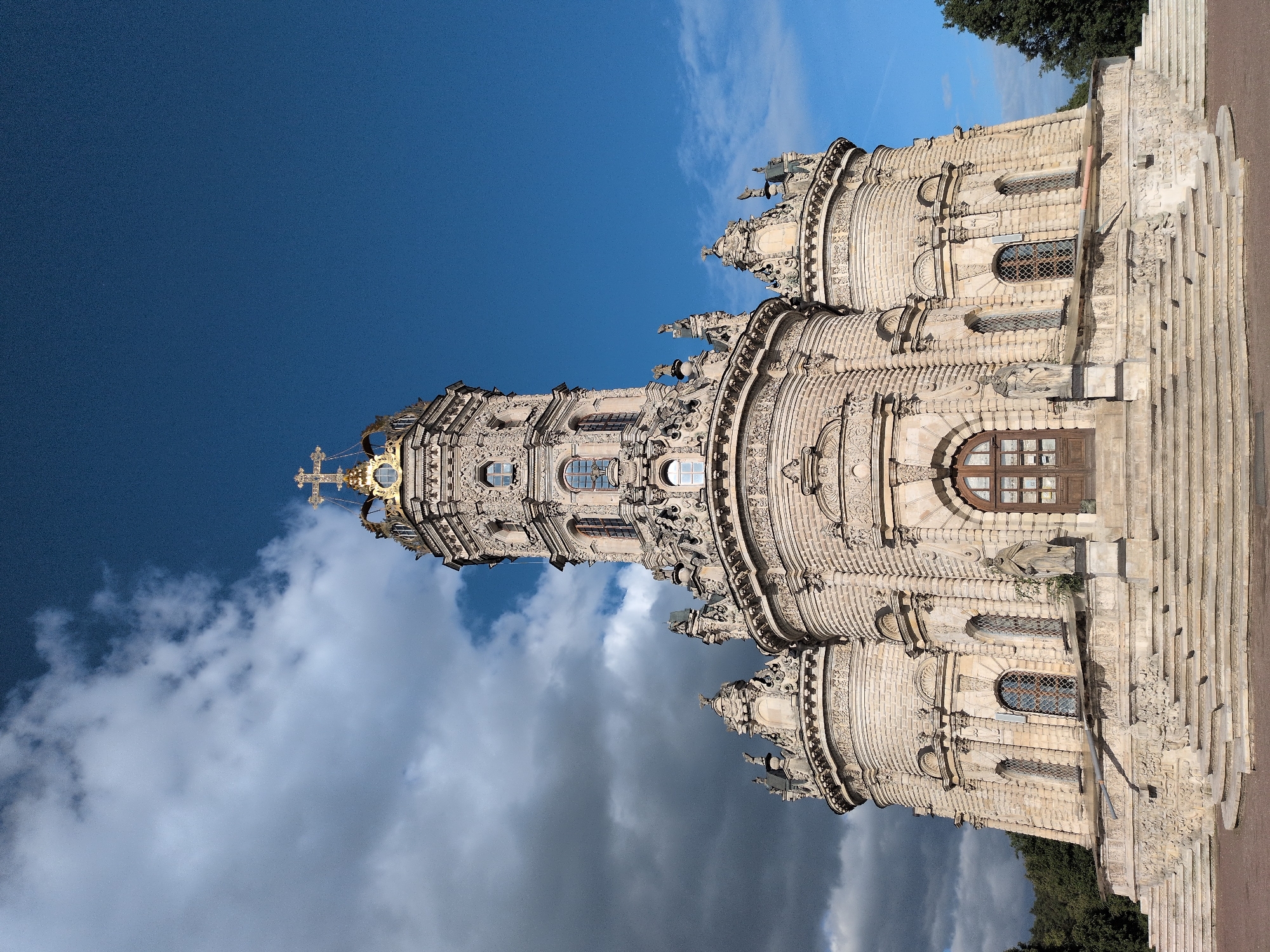 Visitor documents baroque church architecture and wildlife in Dubrovitsy