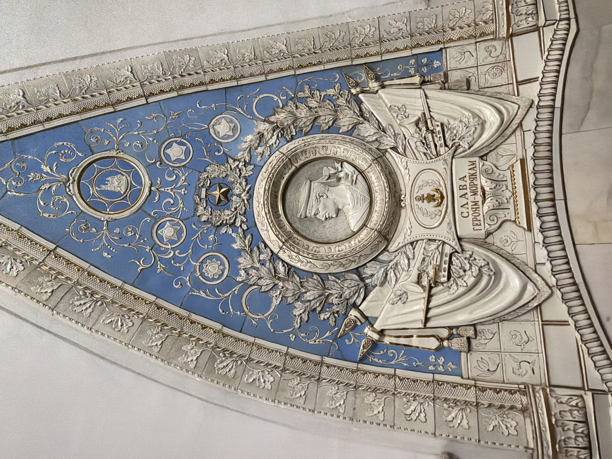 Ornate triangular tile panel documented in Moscow