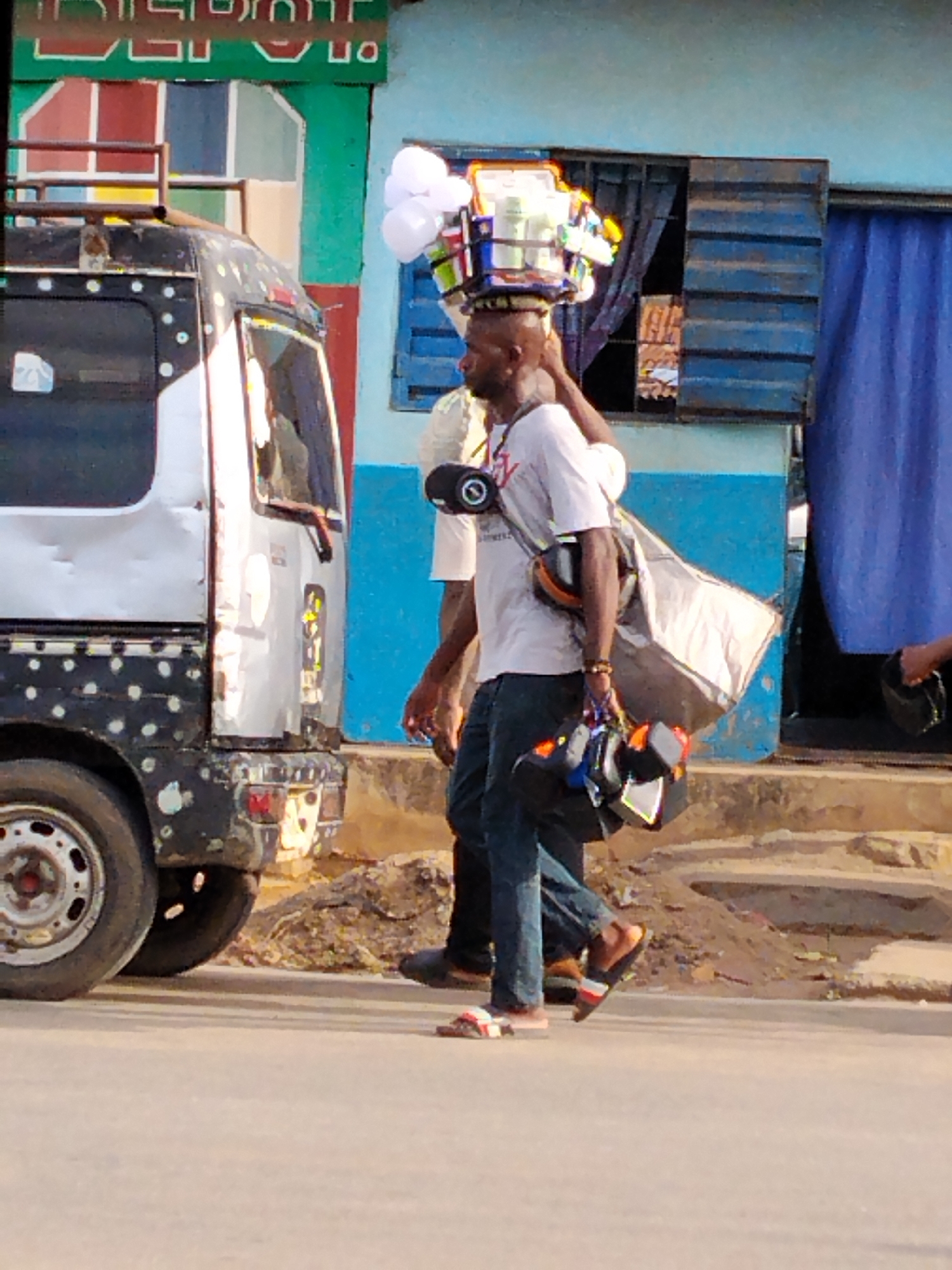 Ordinary street commerce observed in Aba Nigeria afternoon