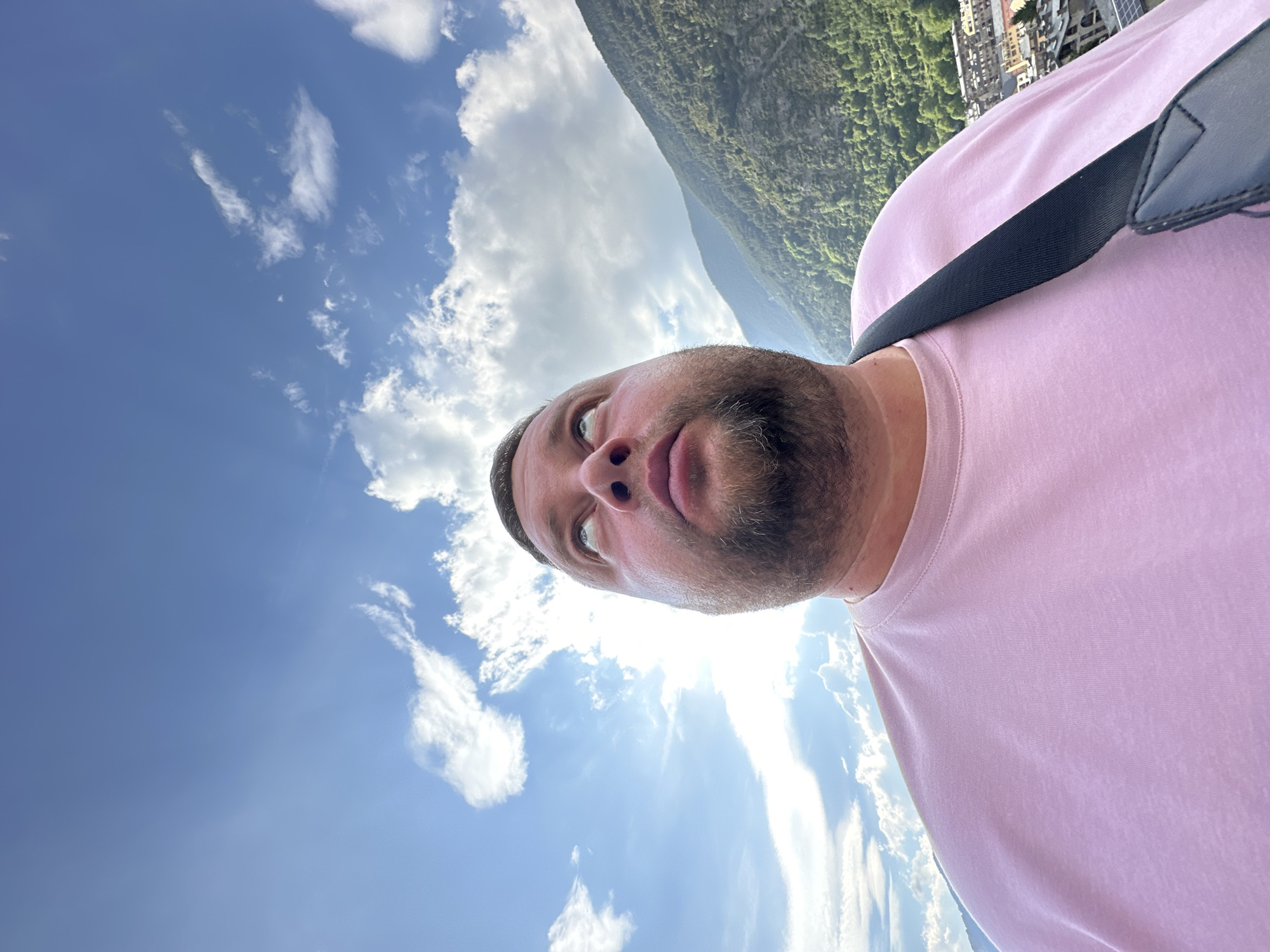 Tourist captures selfies at Encamp valley overlook in Andorra