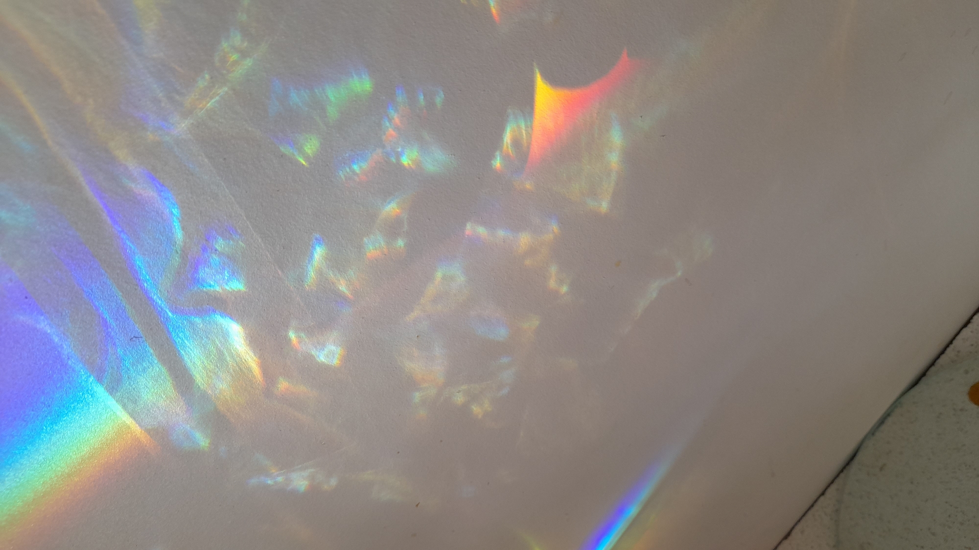 Rainbow light patterns captured on walls in Saint Petersburg