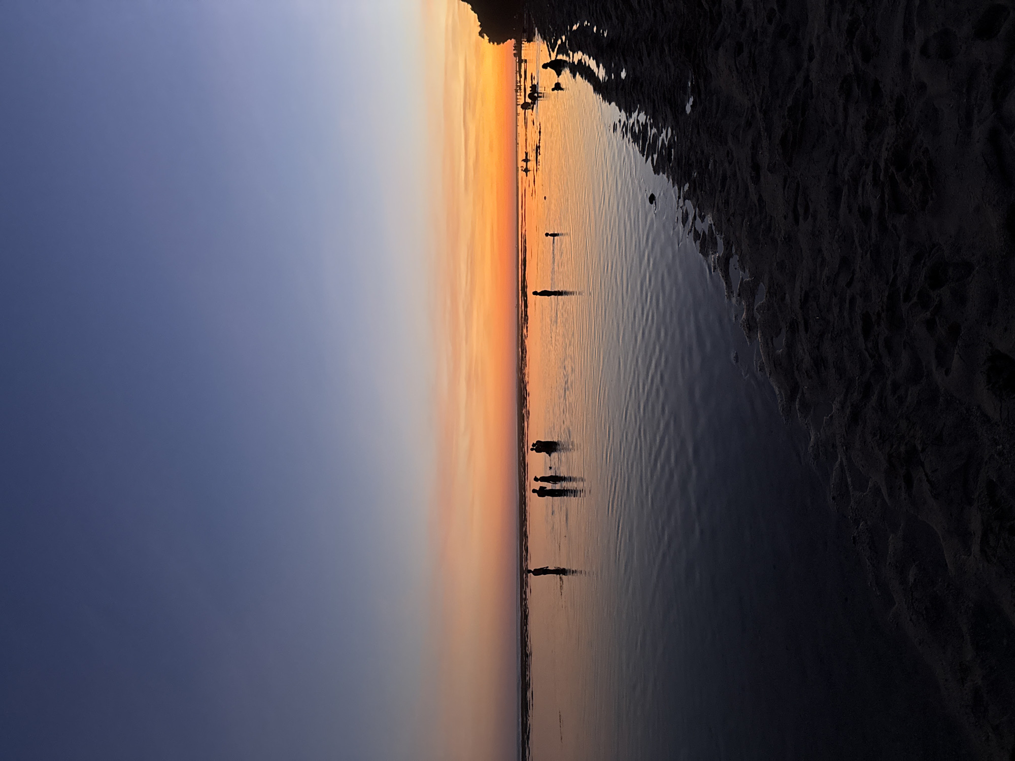 Sunset observed over ocean beach in Kuta Selatan, Indonesia