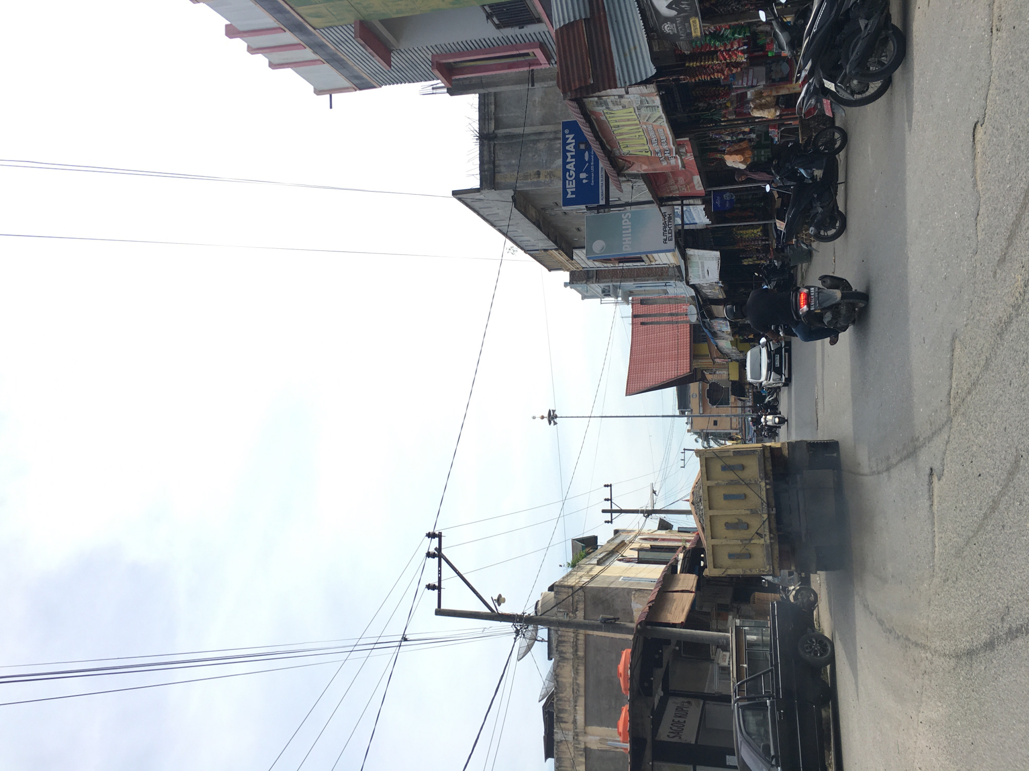 Early morning street scenes documented in Lhokseumawe residential area