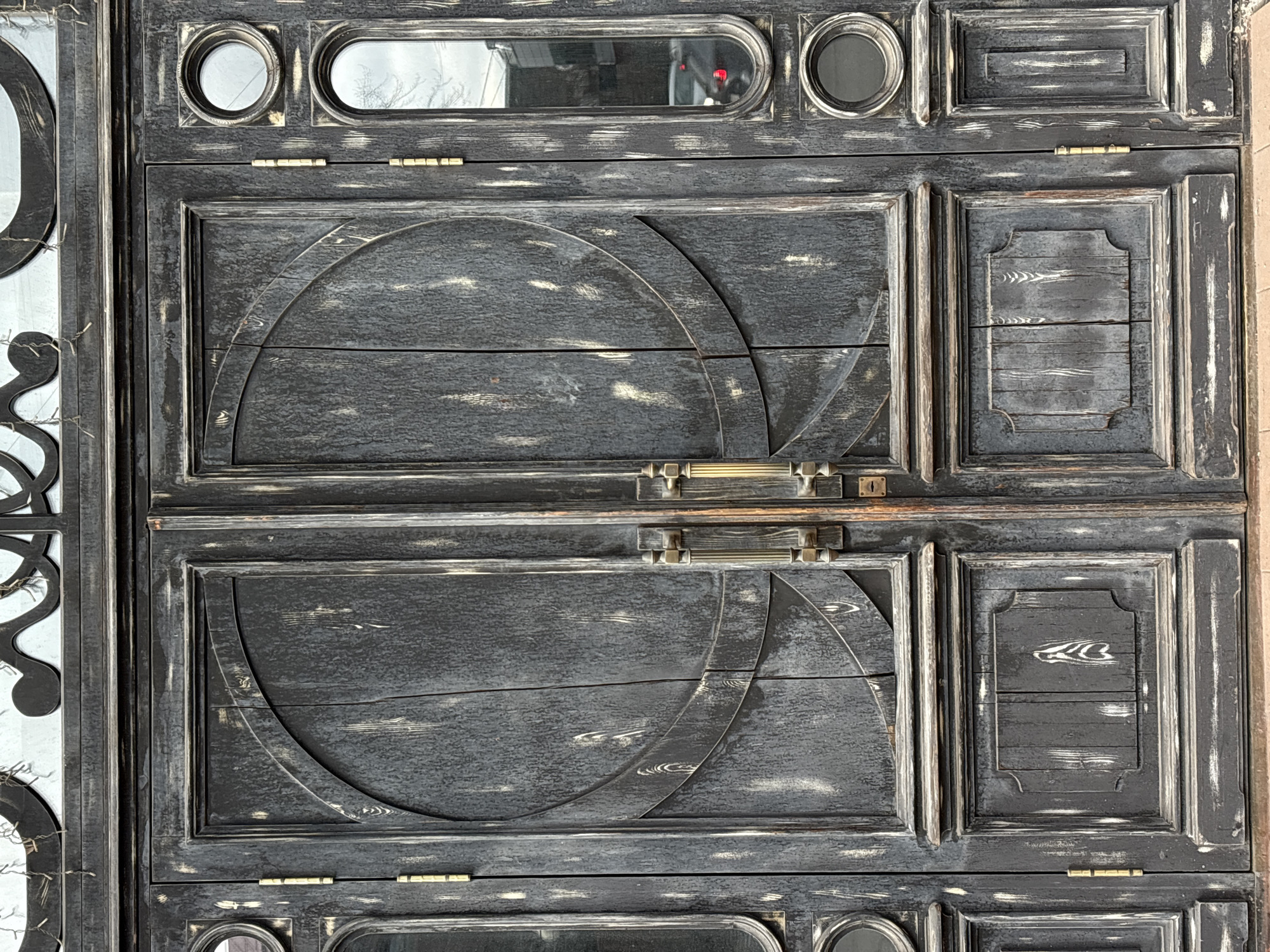 Weathered geometric wooden gate documented in Krasnoyarsk, Russia