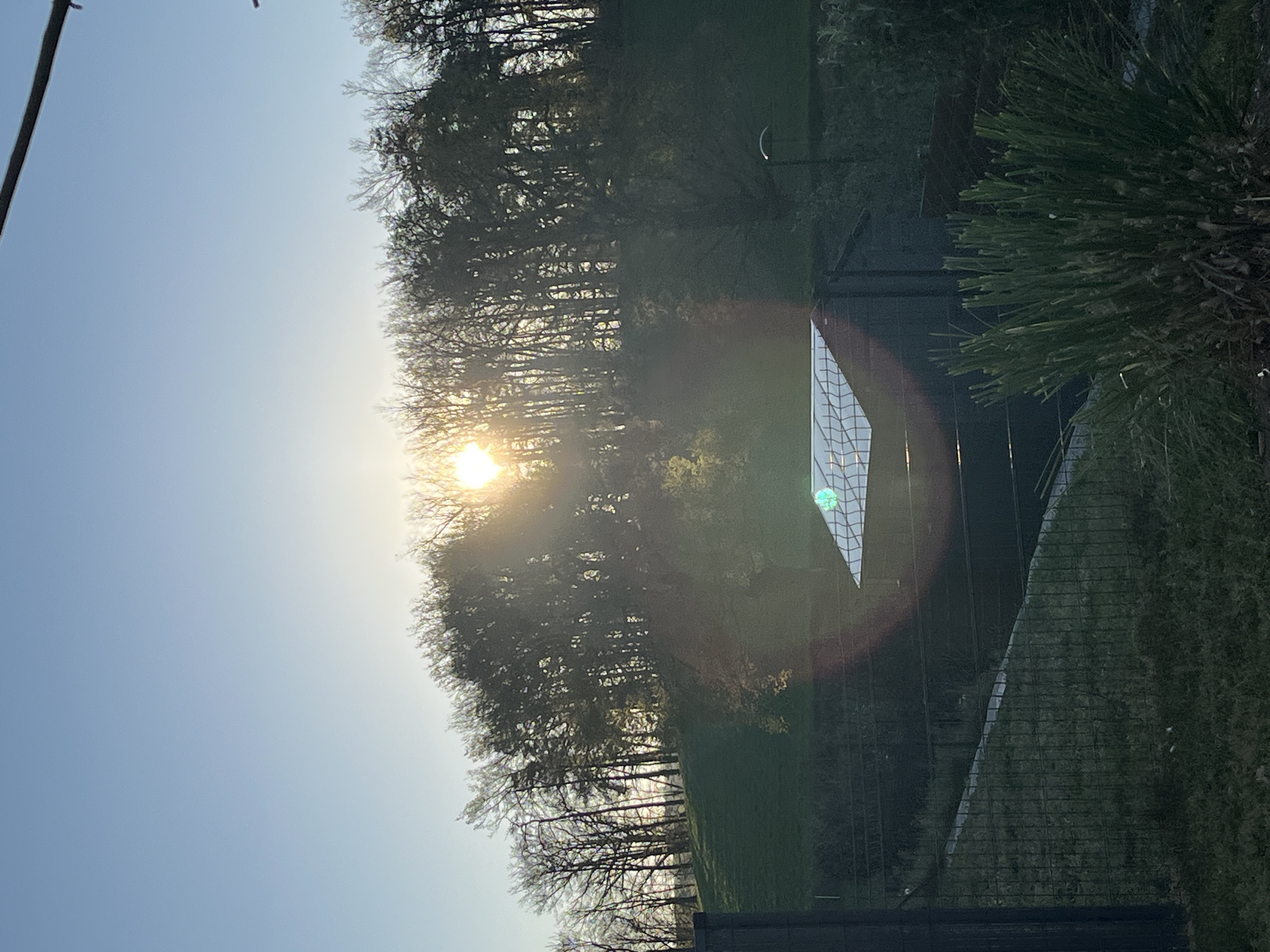 Dawn breaks over Chambœuf with crescent moon visible