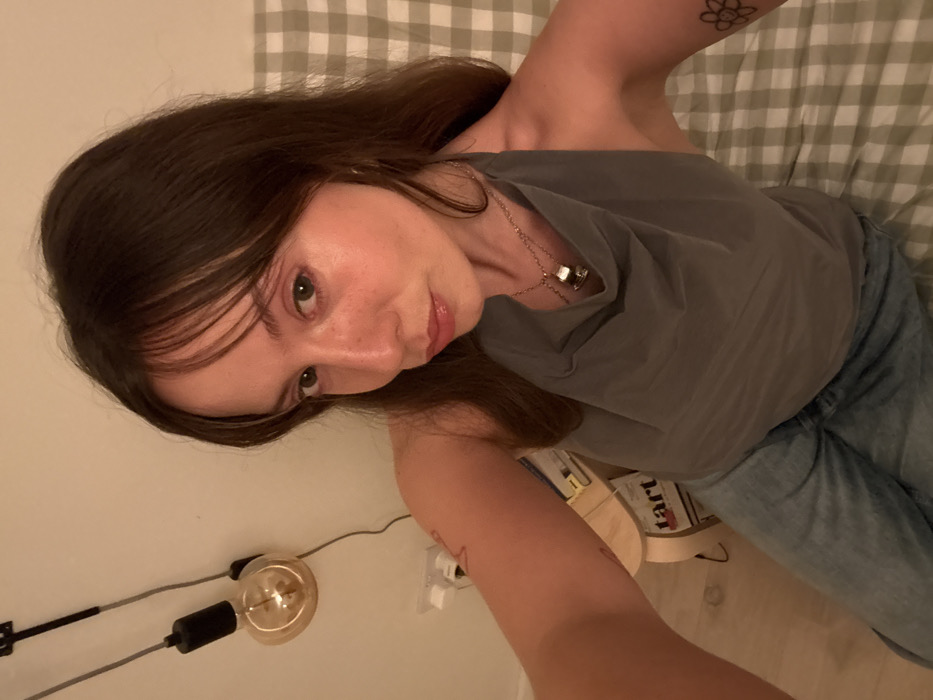 Woman documents personal selfie session across London residence