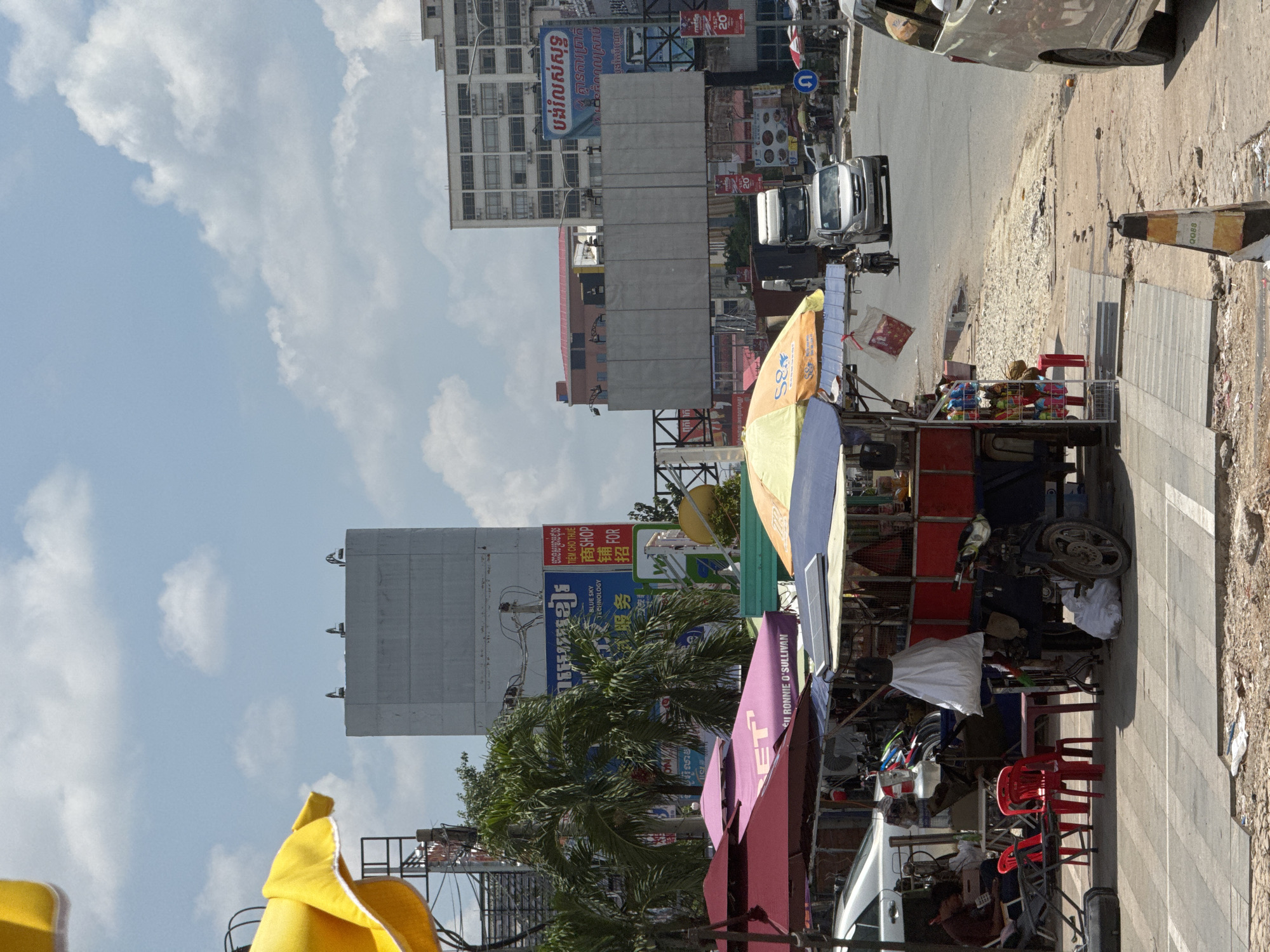 Street life and traffic along Bavet Quarter's border town roads