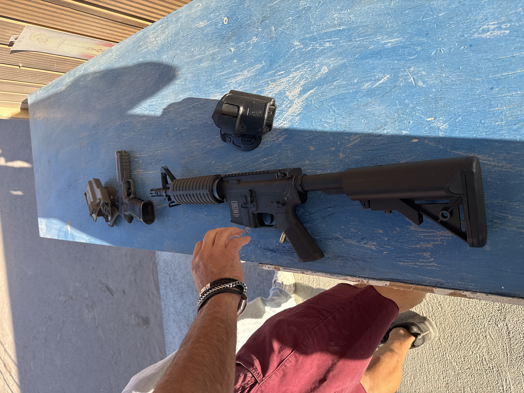 Firearms and ammunition documented on table in Arica, Chile