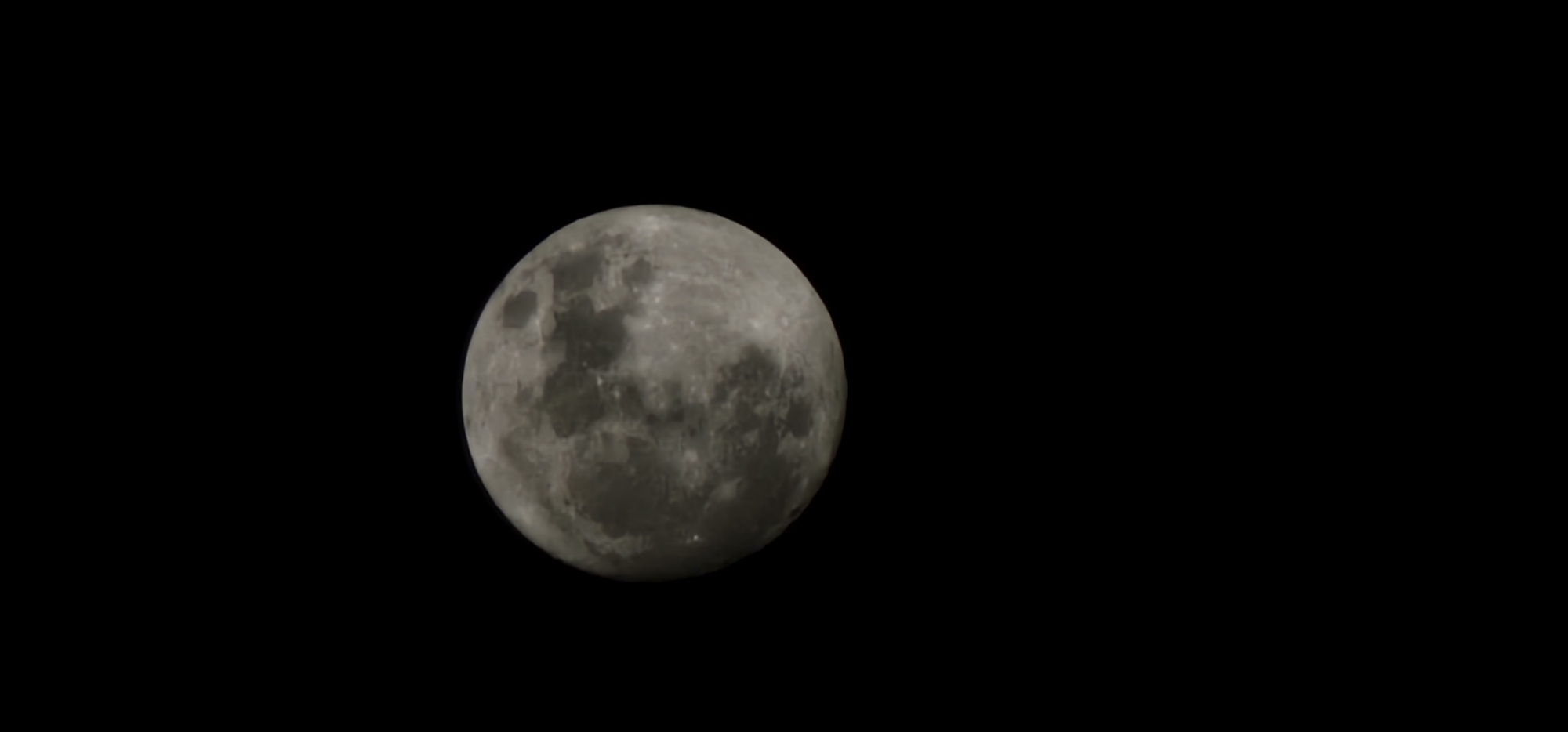Full moon rises clear over Doha night sky
