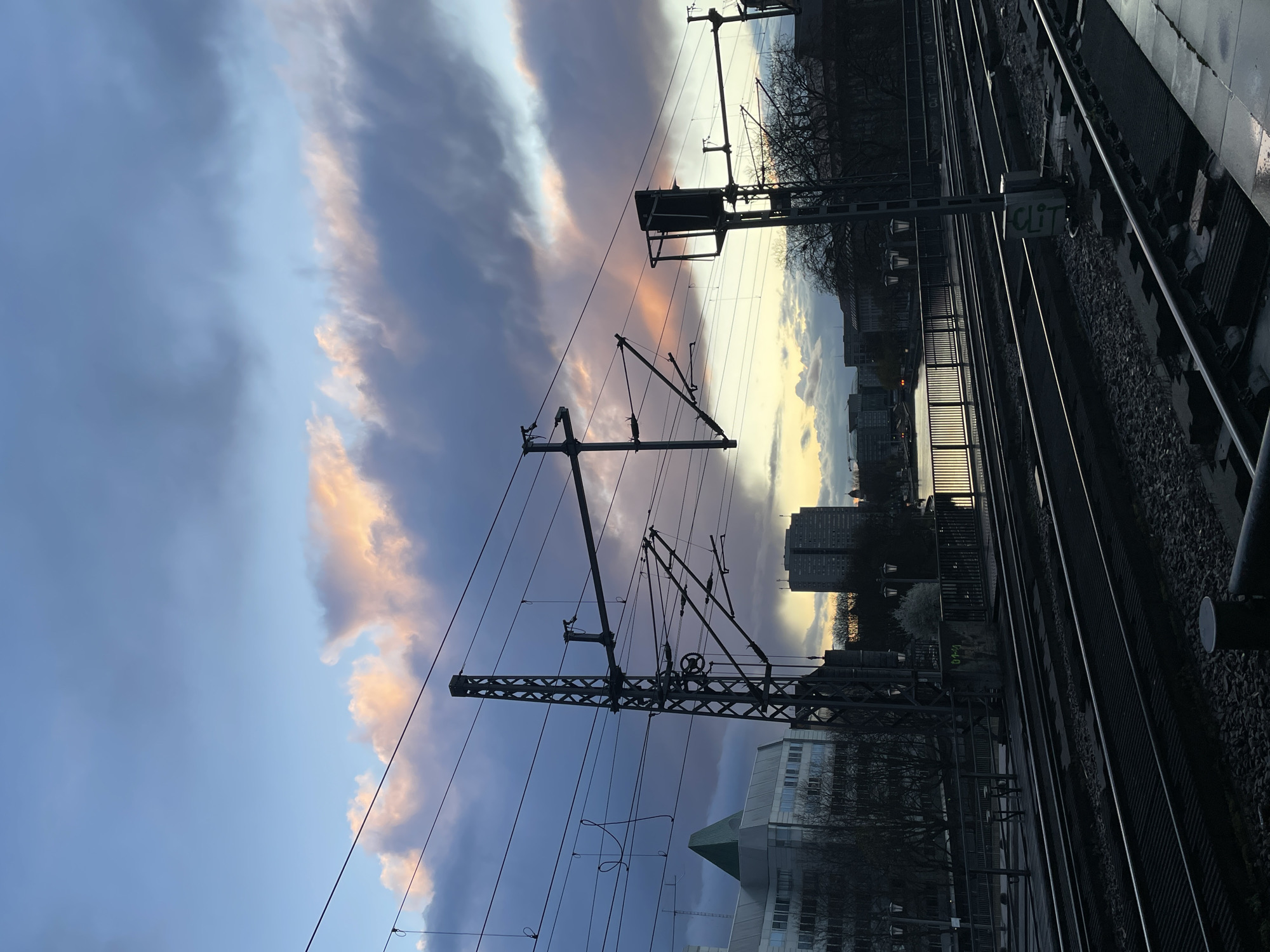 Berlin railway tracks photographed from elevated platform at twilight