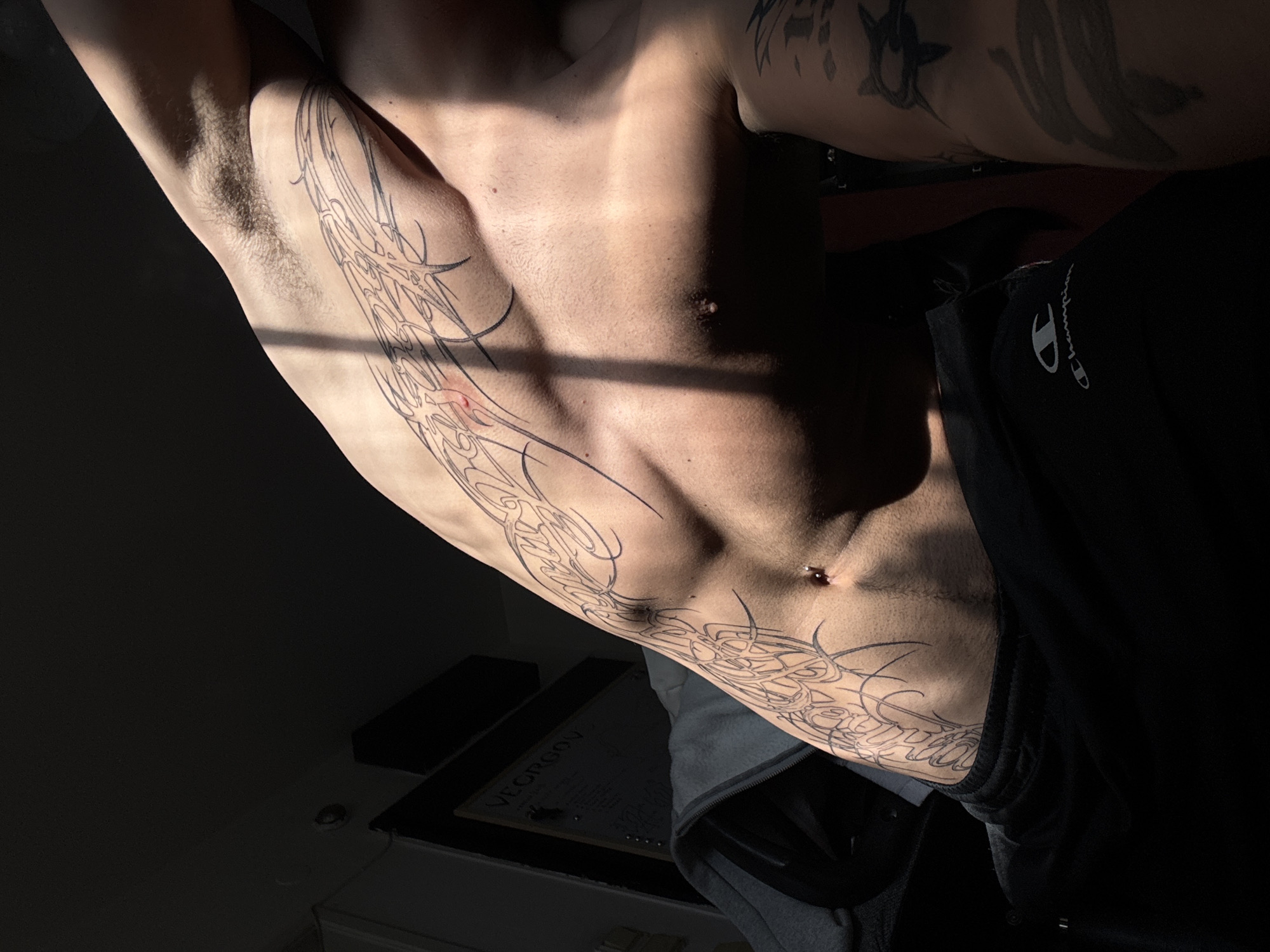 Heavily tattooed person photographed multiple times in Sofia