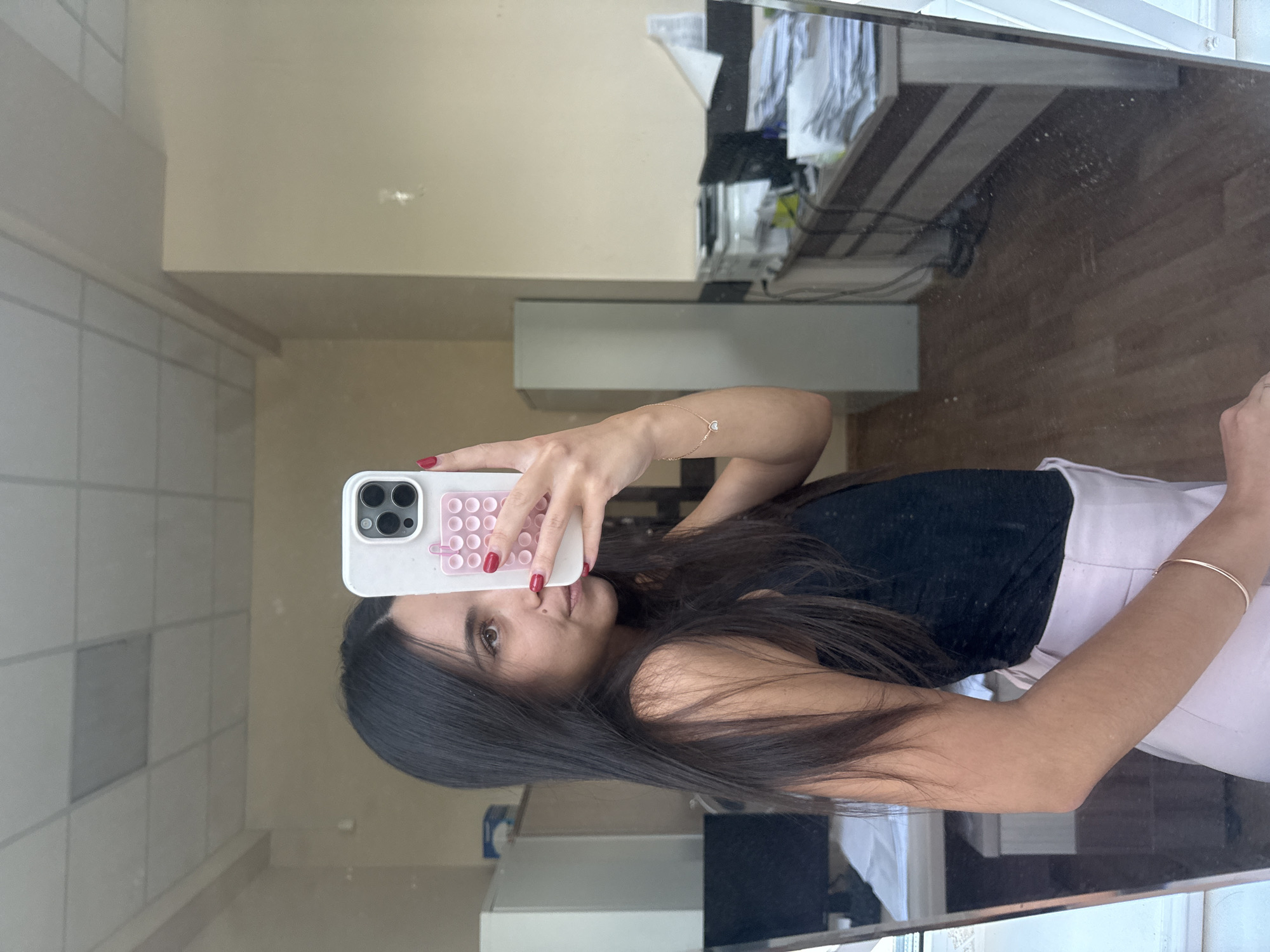 Mirror selfie series, outfit variations, indoor setting