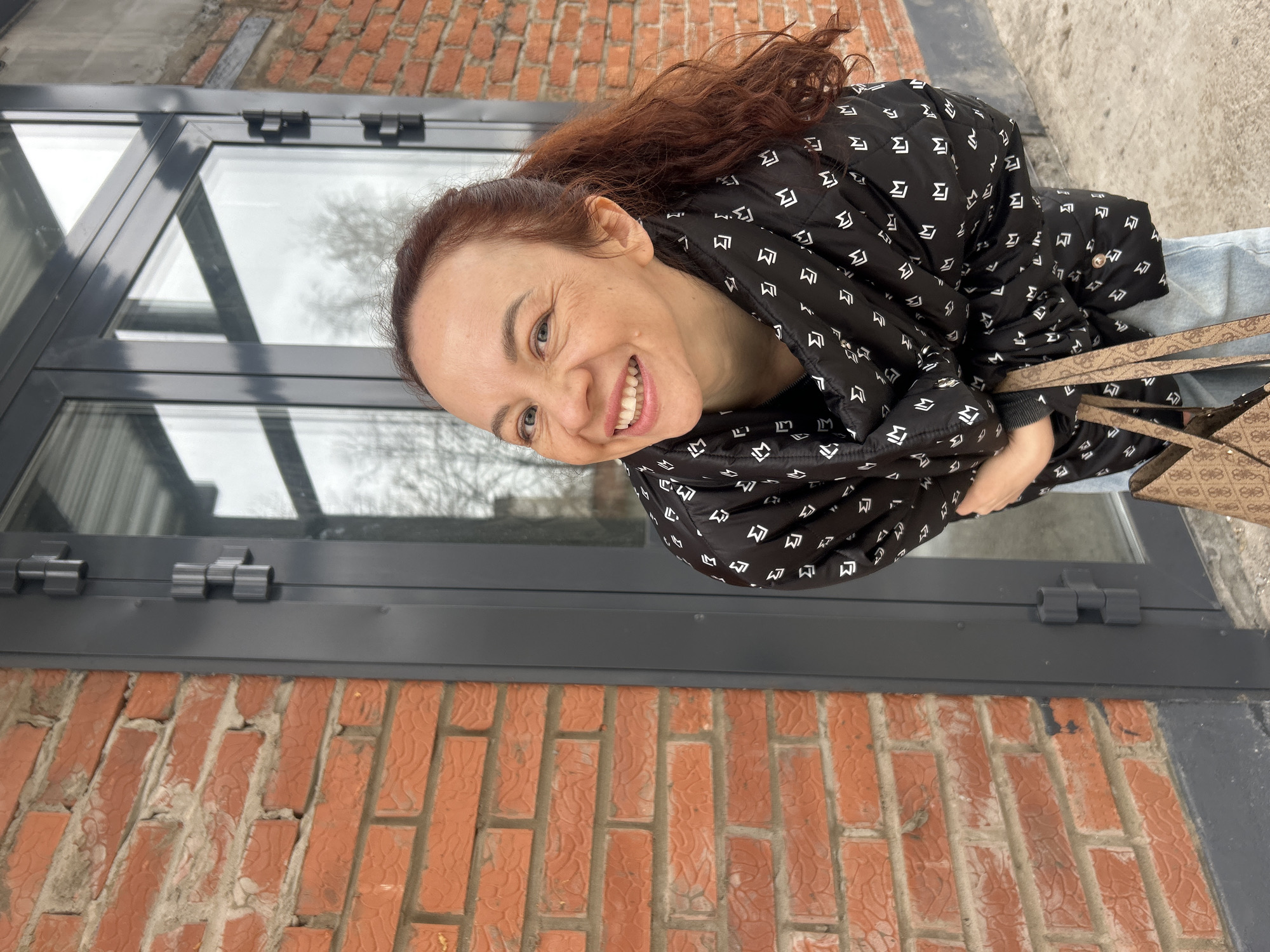 Woman takes selfies with corgi dog in Chaikovsky, Russia