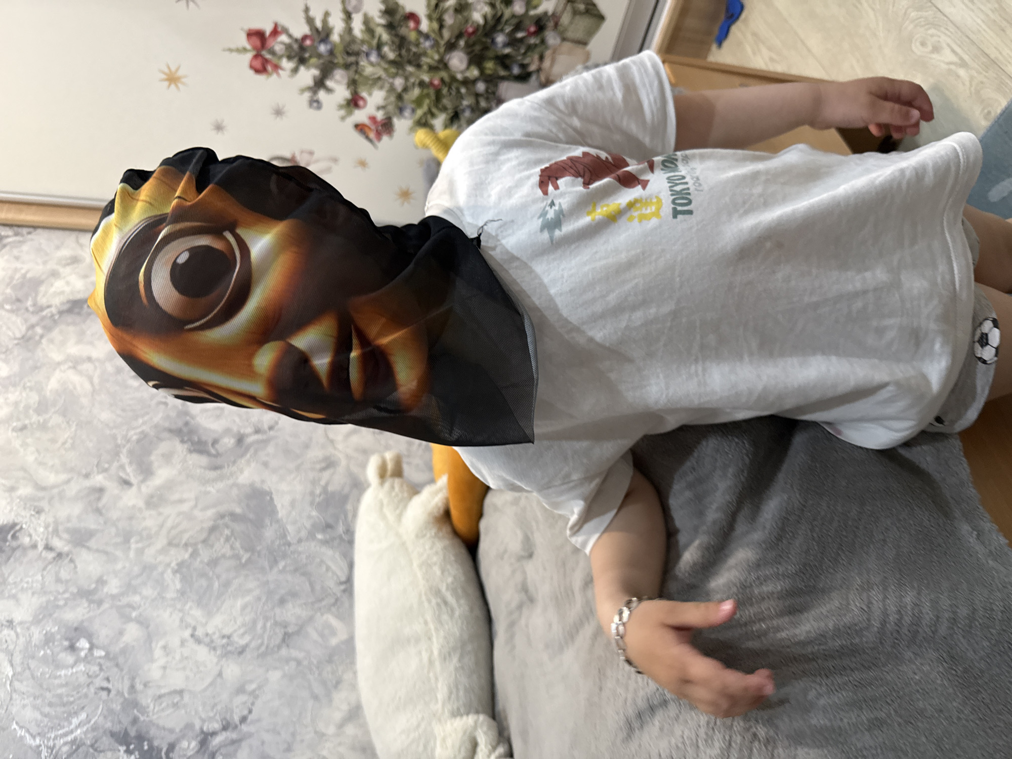 Masked individuals captured in casual indoor moments in Rusanovo