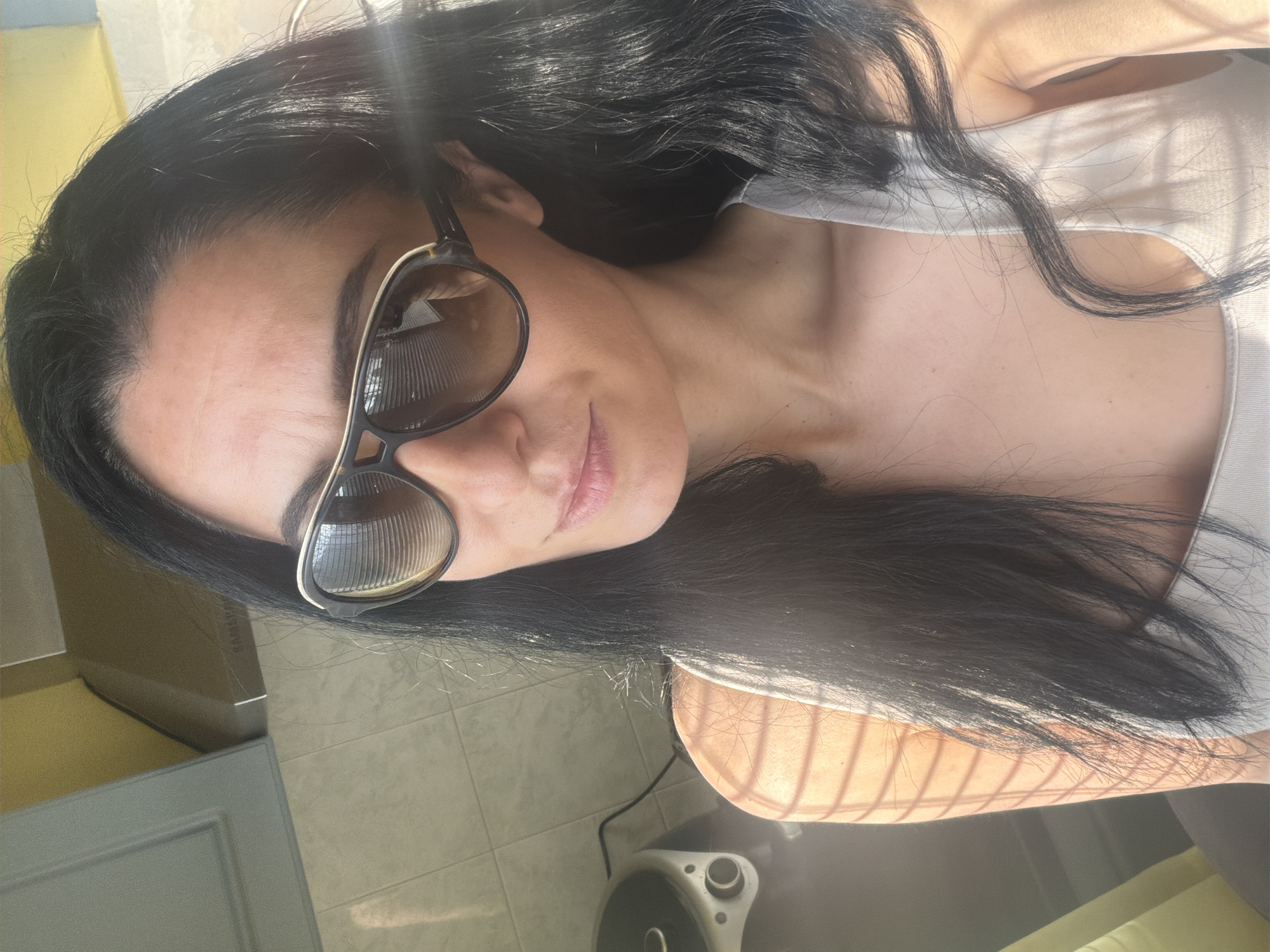 Woman captured in casual selfie and indoor moments in Pleven