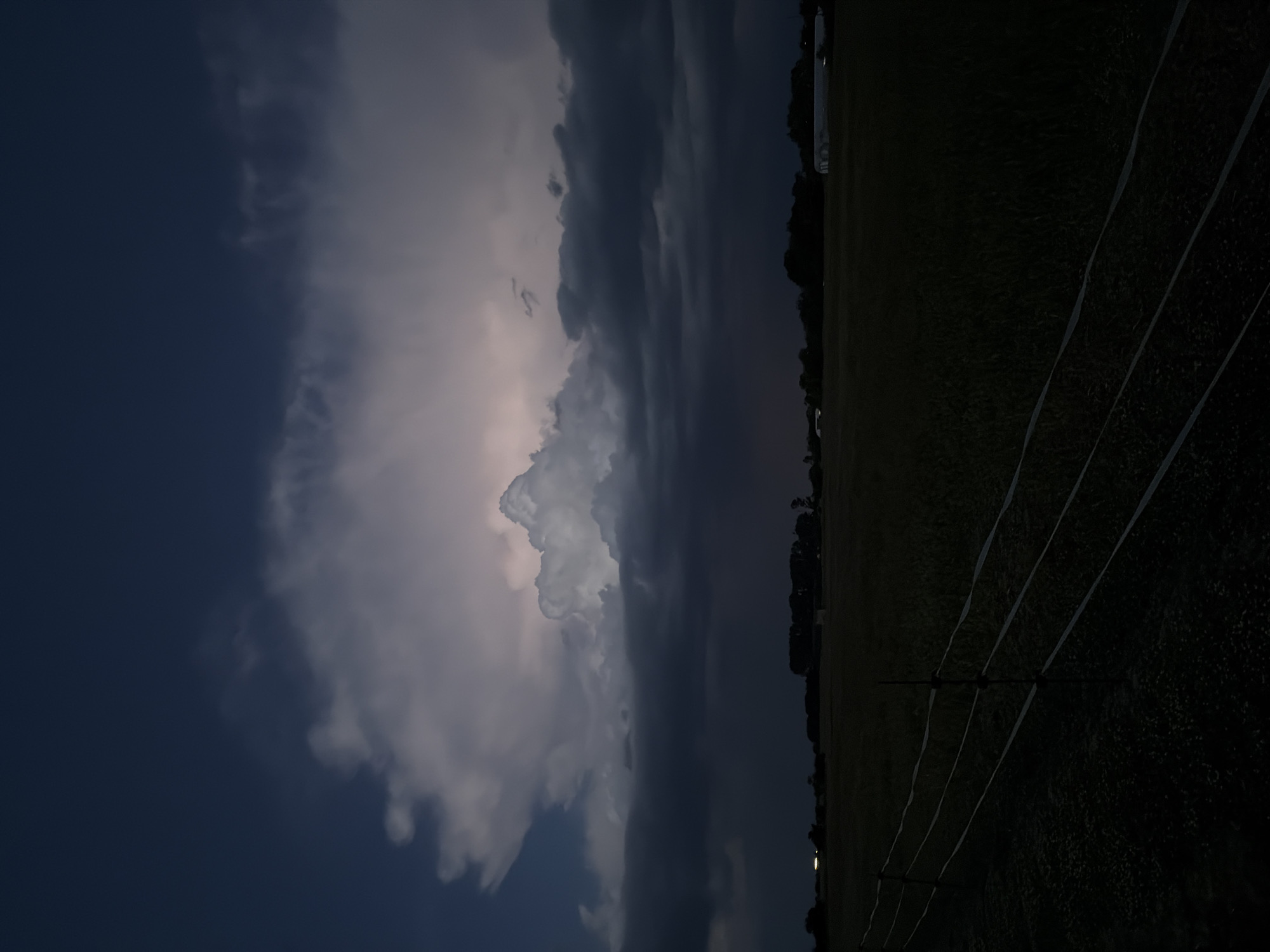 Storm clouds gather over Pishtigovo, Bulgaria at dusk