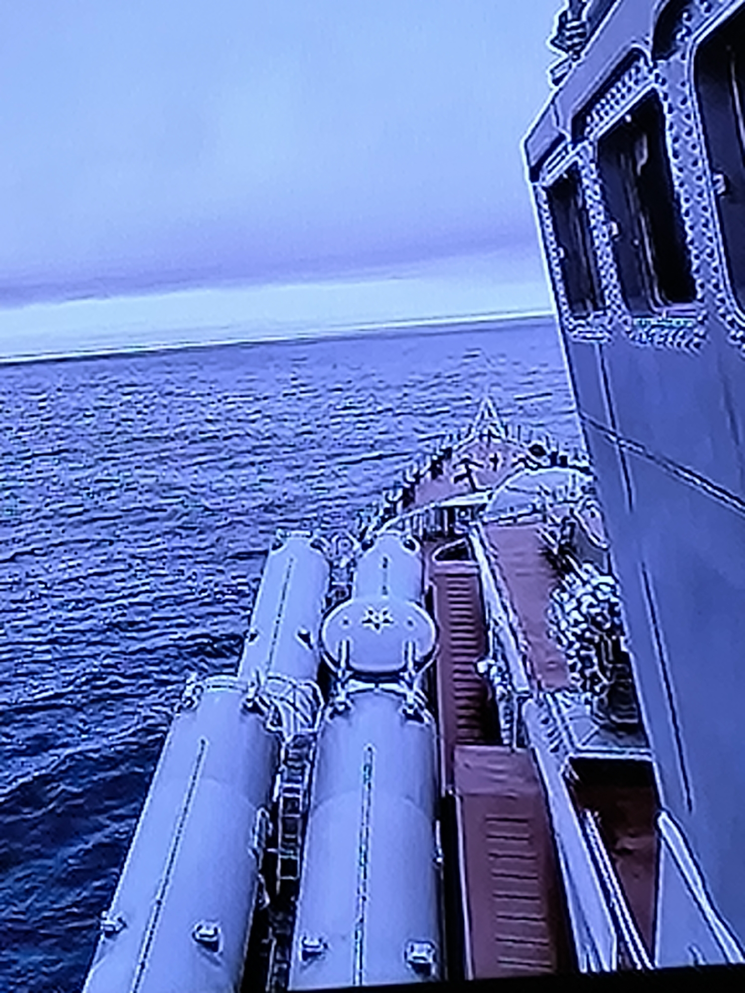 Warship deck and open water activity near Kazan