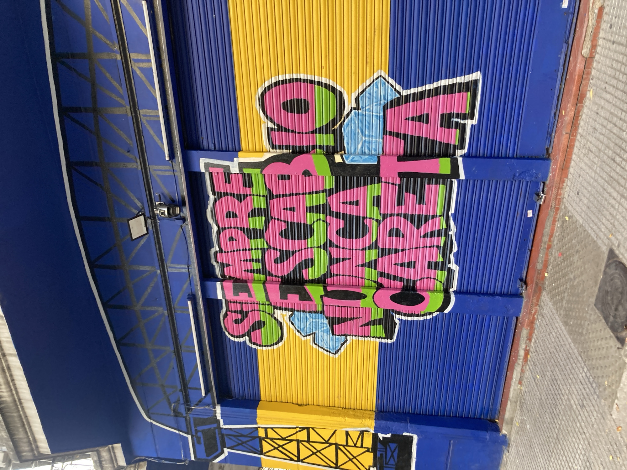 News-themed mural spotted on Buenos Aires storefront