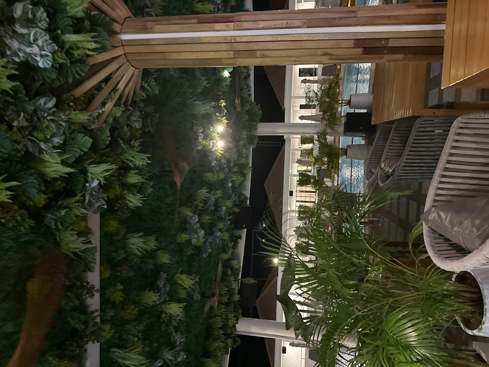 Resort venue documented with pools, dining areas, yellow Mustang