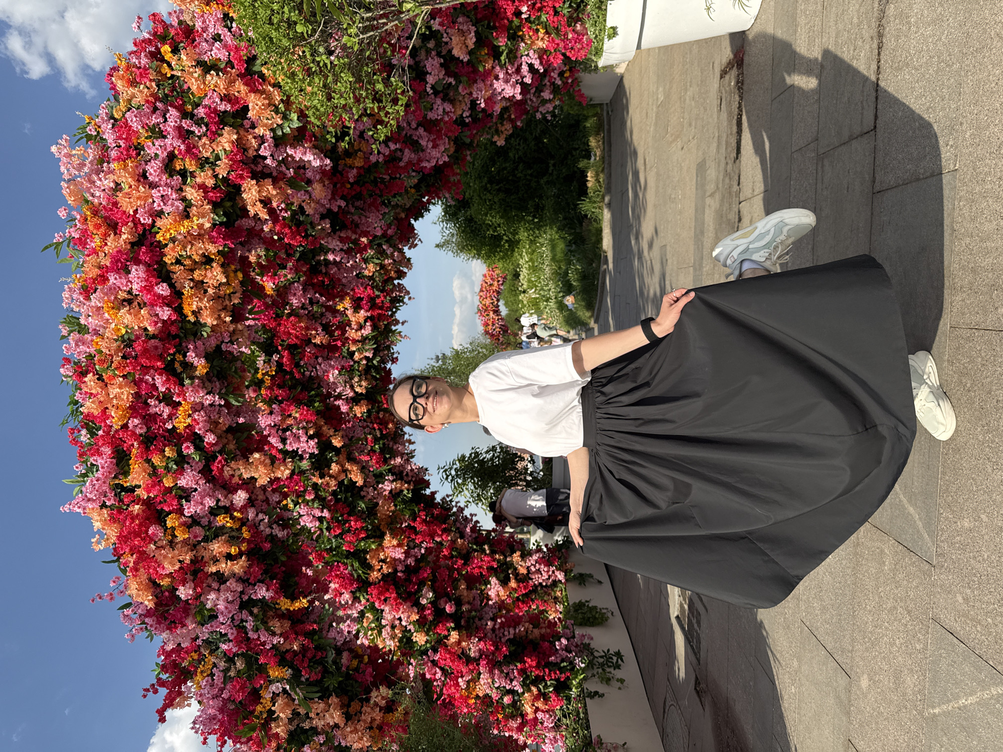 Woman poses for photos at Moscow landmarks and gardens
