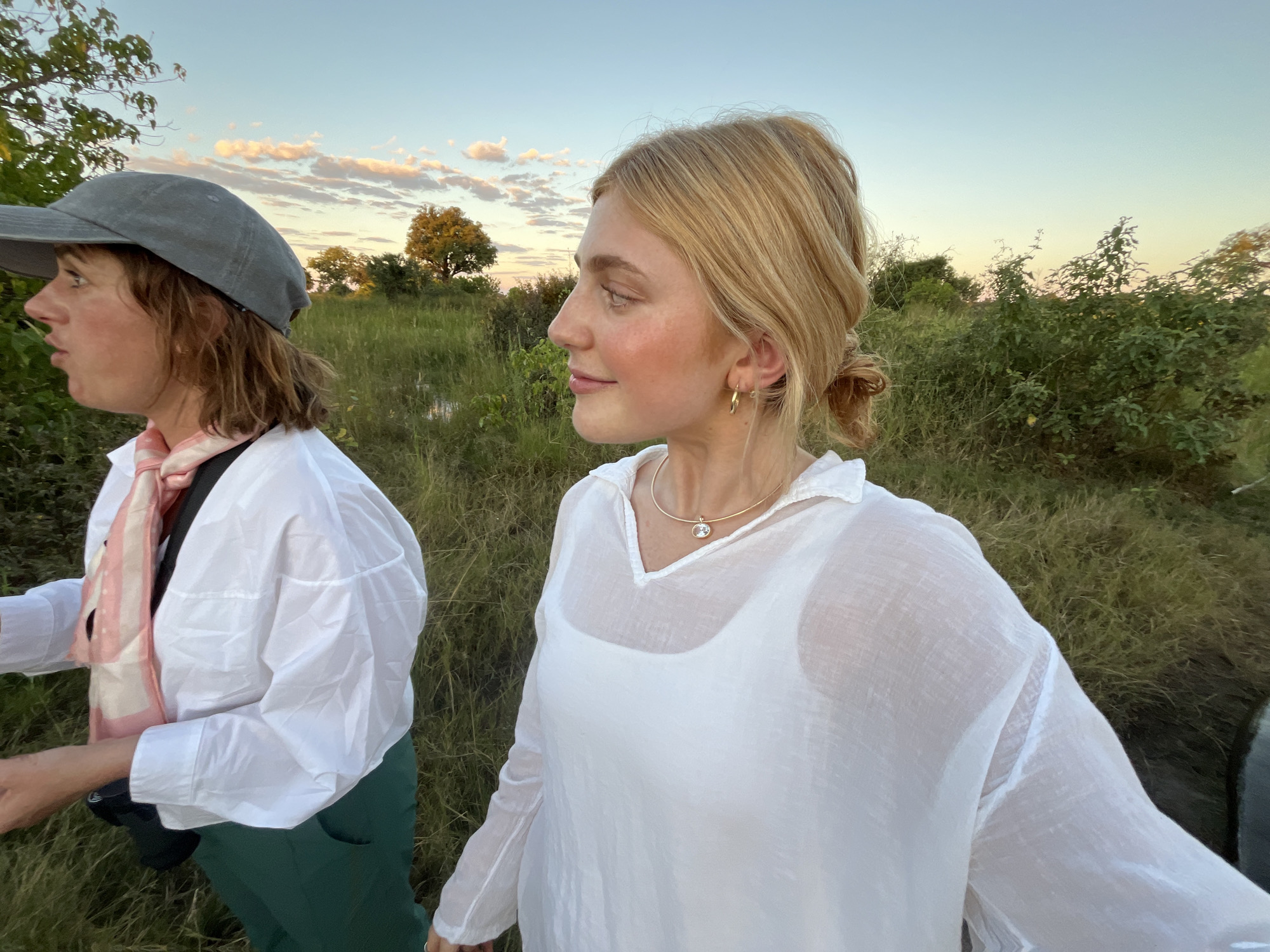 Woman photographed in multiple poses across Lobilos, Botswana grasslands